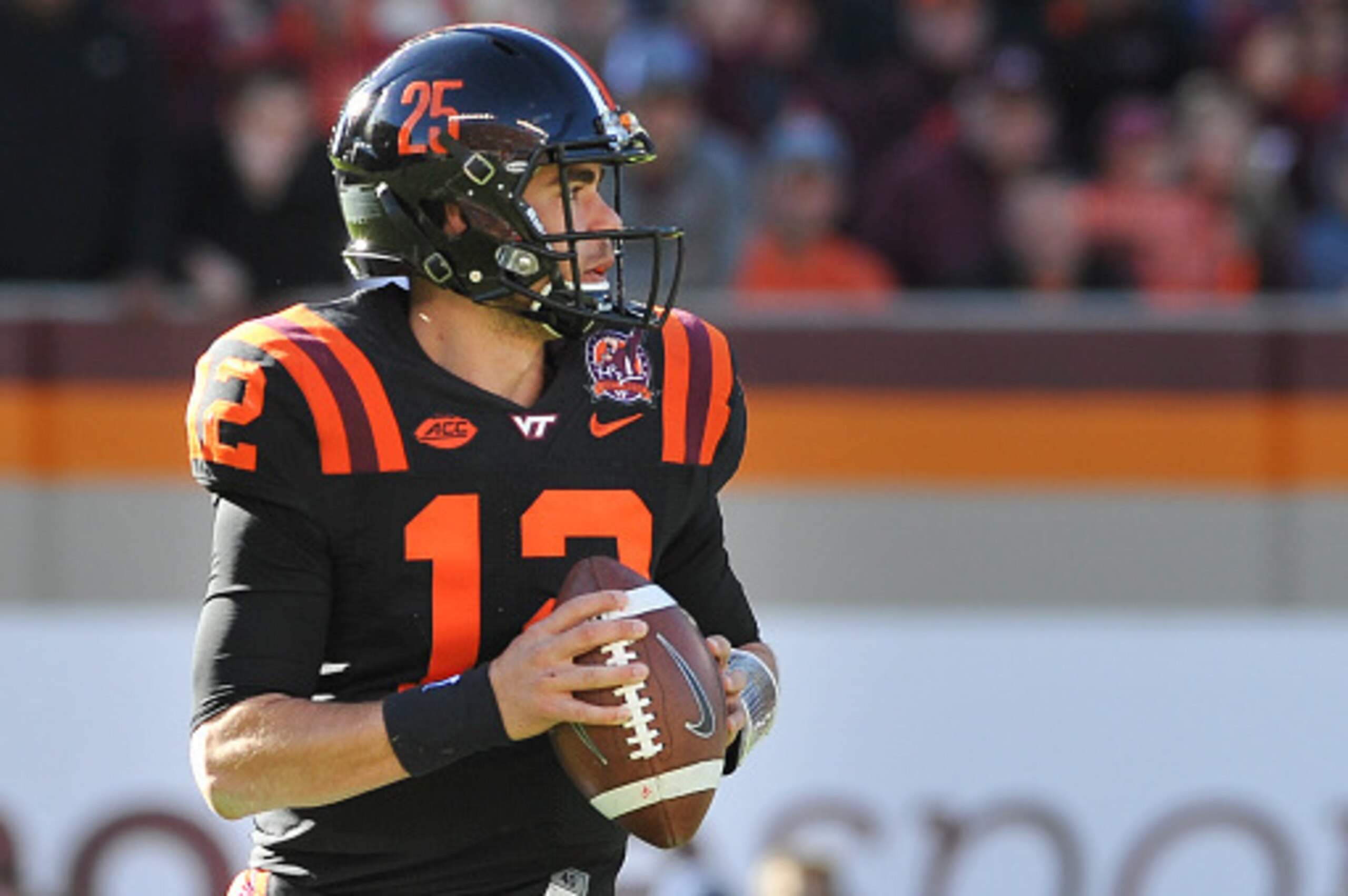 BLACKSBURG, VA - NOVEMBER 21: Quarterback Michael Brewer #12 of the Virginia Tech Hokies looks to pass against the North Carolina Tar Heels in the second half on November 21, 2015 in Blacksburg, Virginia. (Photo by Michael Shroyer/Getty Images)