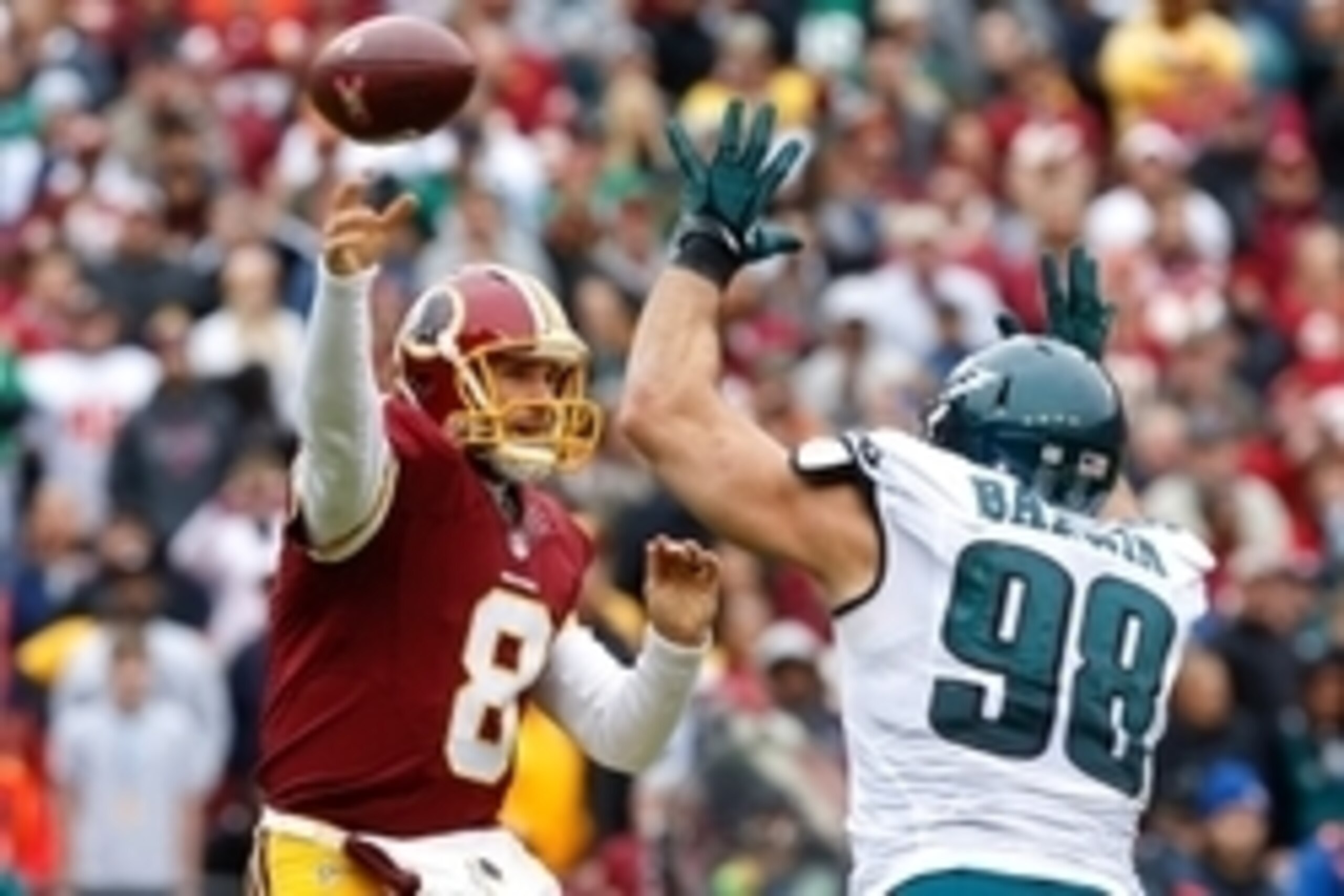 Oct 4, 2015; Landover, MD, USA; Washington Redskins quarterback Kirk Cousins (8) throws the ball over Philadelphia Eagles outside linebacker Connor Barwin (98) at FedEx Field. Mandatory Credit: Geoff Burke-USA TODAY Sports