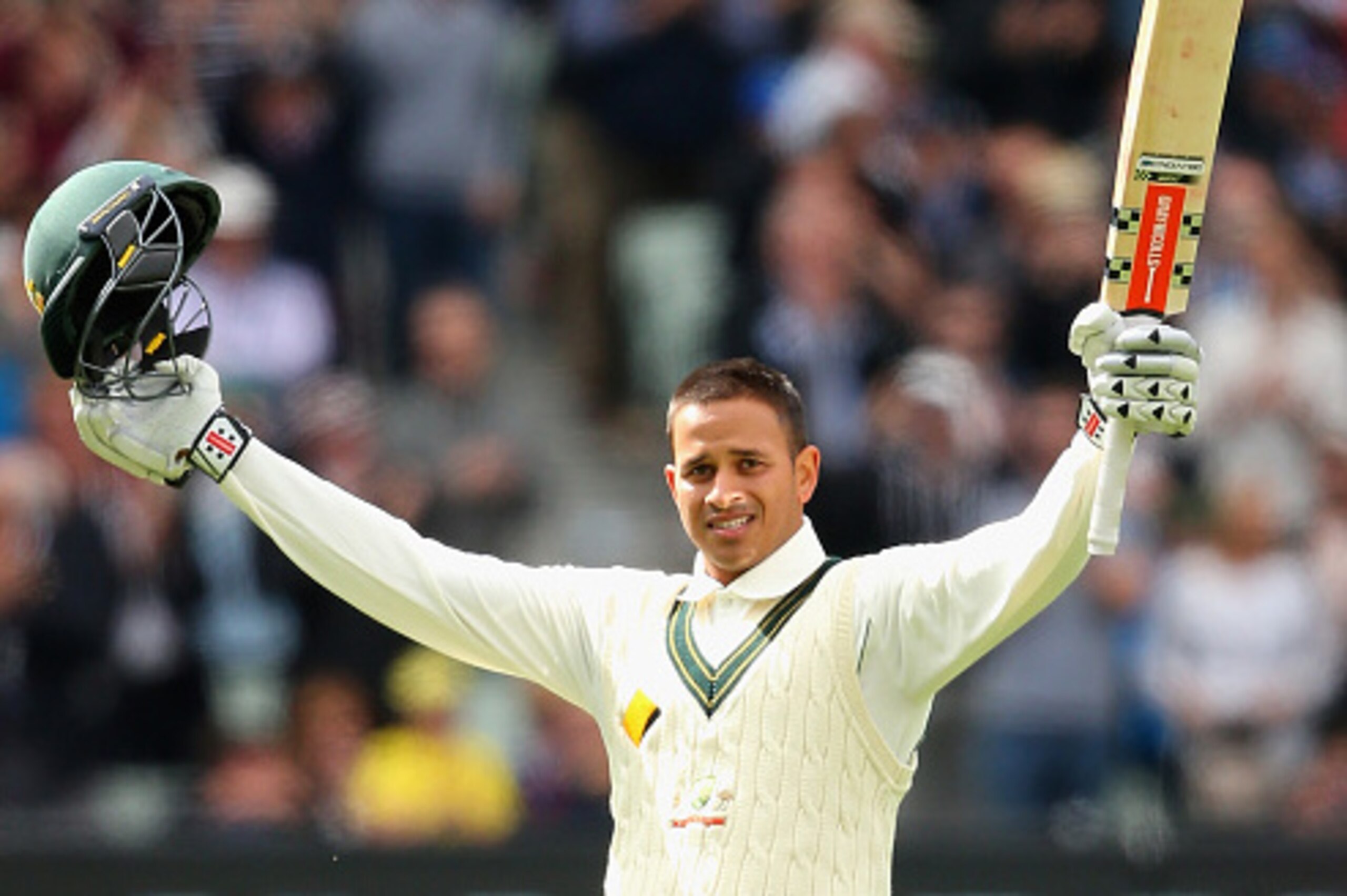 MELBOURNE, AUSTRALIA - DECEMBER 26:  Usman Khawaja of Australia celebrates making a century during day one of the Second Test match between Australia and the West Indies at Melbourne Cricket Ground on December 26, 2015 in Melbourne, Australia.  (Photo by 