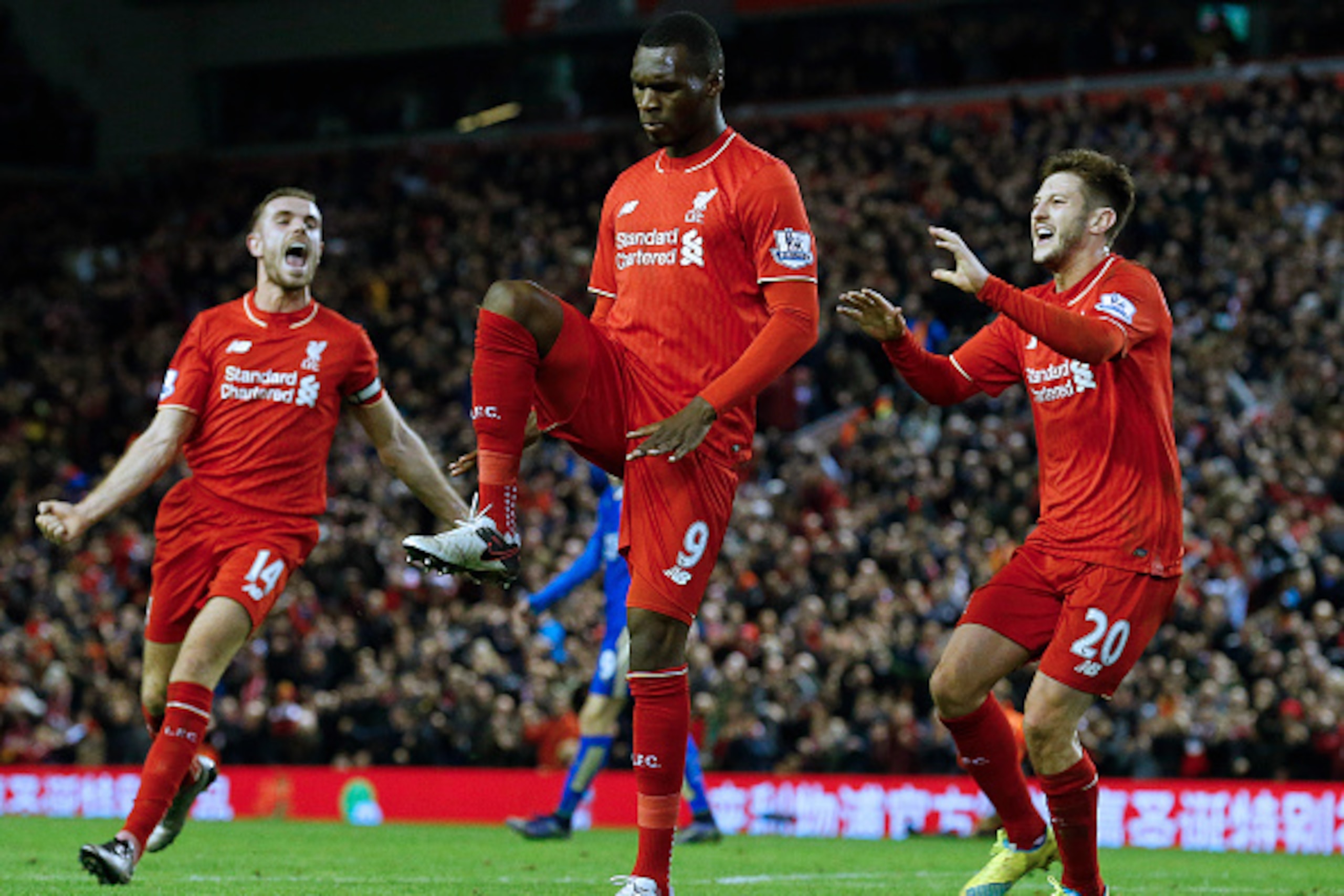 Liverpool's Zaire-born Belgian striker Christian Benteke (C) celebrates with teammates after scoring the opening goal of during the English Premier League football match between Liverpool and Leicester City at the Anfield stadium in Liverpool, north-west Liverpool's Zaire-born Belgian striker Christian Benteke (C) celebrates with teammates after scoring the opening goal of during the English Premier League football match between Liverpool and Leicester City at the Anfield stadium in Liverpool, north-west