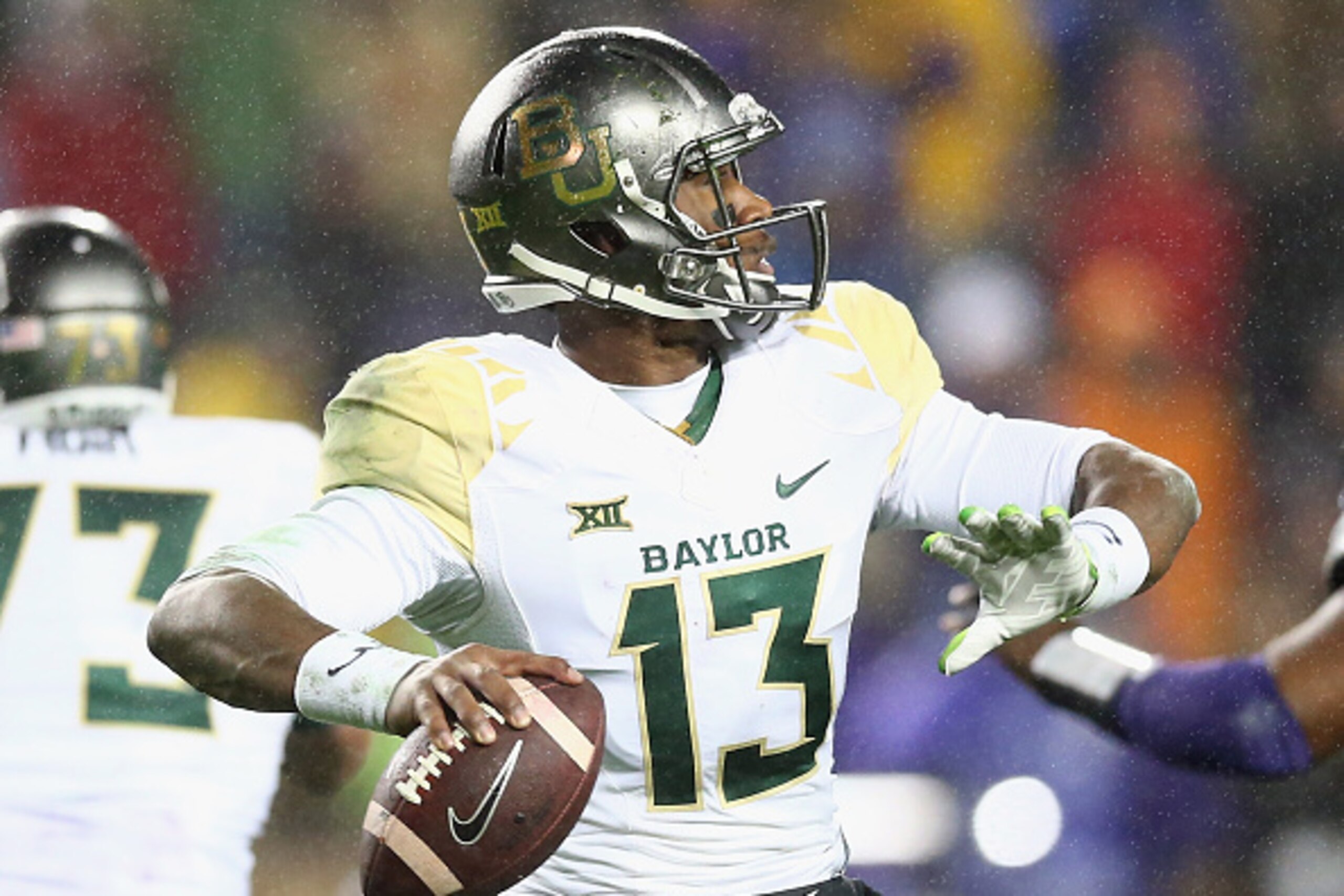 FORT WORTH, TX - NOVEMBER 27:  Chris Johnson #13 of the Baylor Bears throws against the TCU Horned Frogs in the first quarter at Amon G. Carter Stadium on November 27, 2015 in Fort Worth, Texas.  (Photo by Ronald Martinez/Getty Images)
