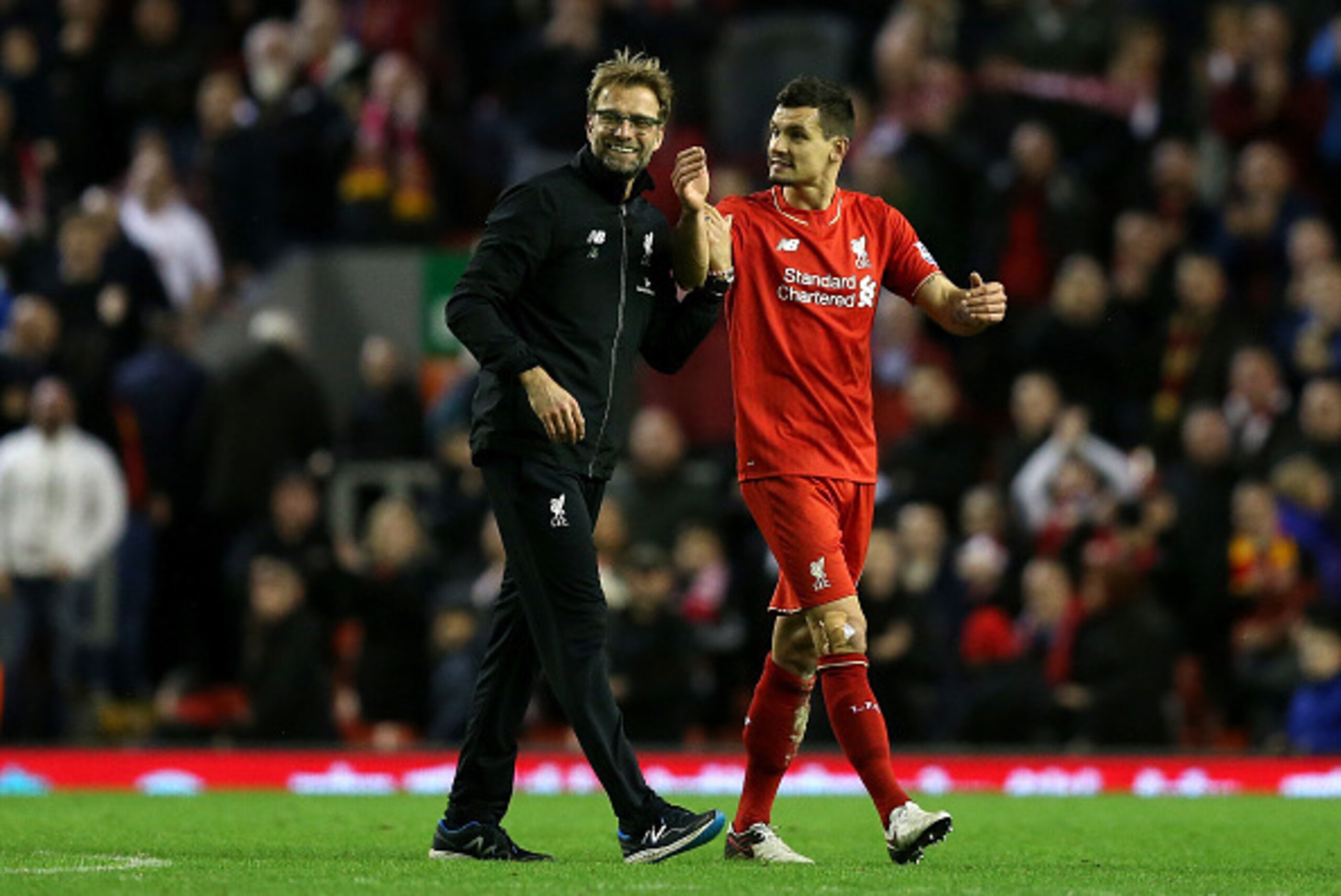 LIVERPOOL, ENGLAND - DECEMBER 26:  Jurgen Klopp, Manager of Liverpool celebrates with Dejan Lovren of Liverpool following the Barclays Premier League match between Liverpool and Leicester City at Anfield on December 26, 2015 in Liverpool, England.  (Photo