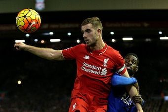 LIVERPOOL, ENGLAND - DECEMBER 26:  Jordan Henderson of Liverpool holds off Nathan Dyer of Leicester City during the Barclays Premier League match between Liverpool and Leicester City at Anfield on December 26, 2015 in Liverpool, England.  (Photo by Chris 