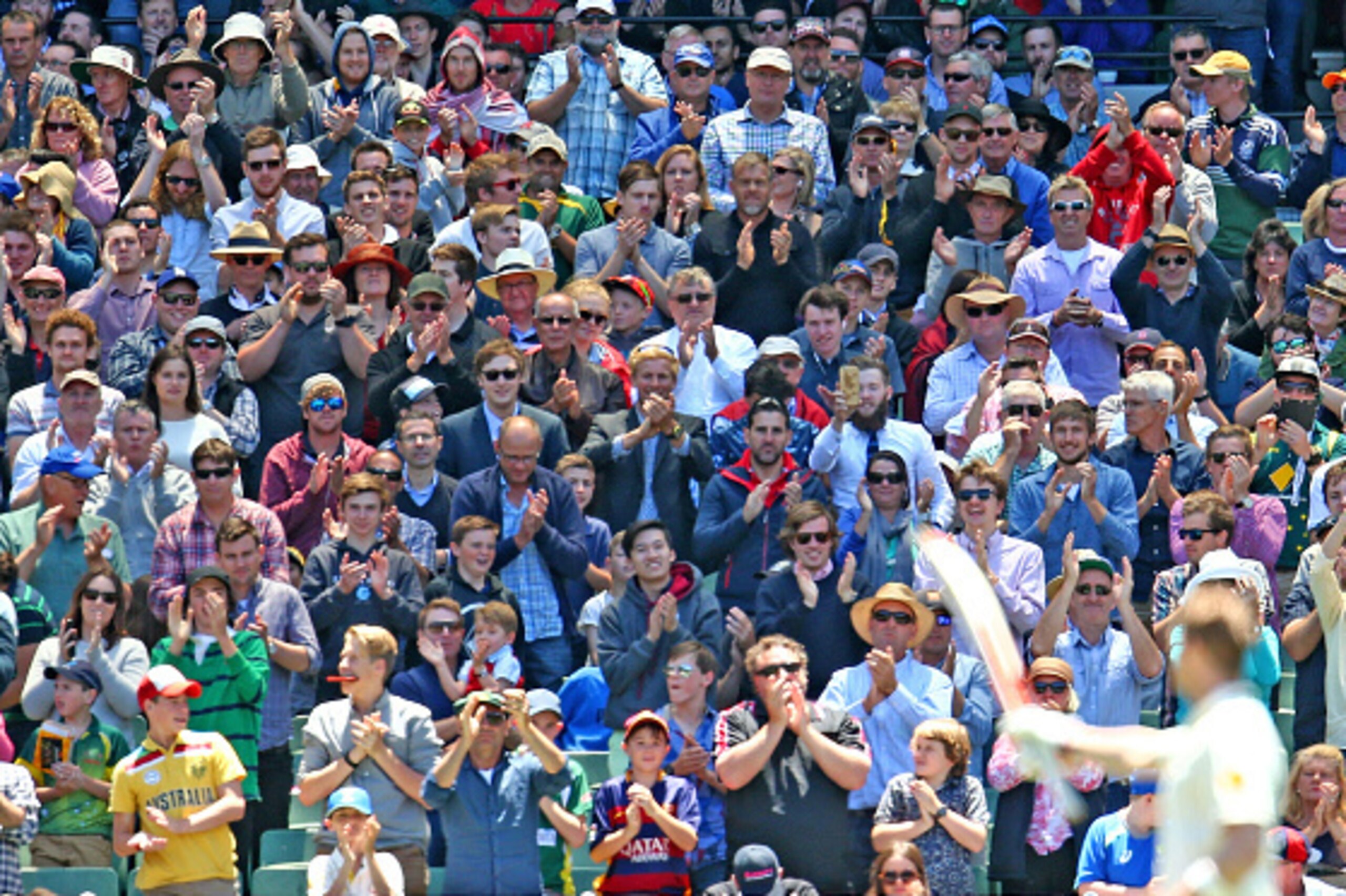 MELBOURNE, AUSTRALIA - DECEMBER 27:  The crowd applauds as Steven Smith  (R) of Australia reaches his century during day two of the Second Test match between Australia and the West Indies at the Melbourne Cricket Ground on December 27, 2015 in Melbourne, 