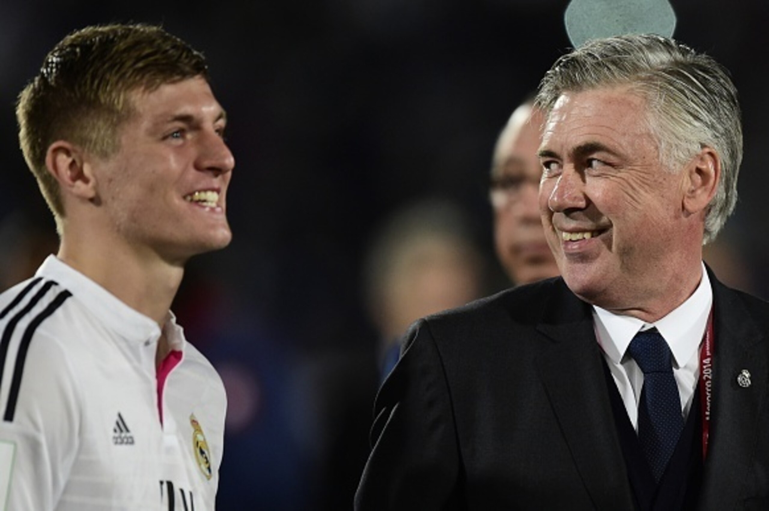 Real Madrid's Italian coach Carlo Ancelotti (R) and German midfielder Toni Kroos smile at the end of the FIFA Club World Cup final football match against San Lorenzo at the Marrakesh stadium in the Moroccan city of Marrakesh on December 20, 2014. Real Mad