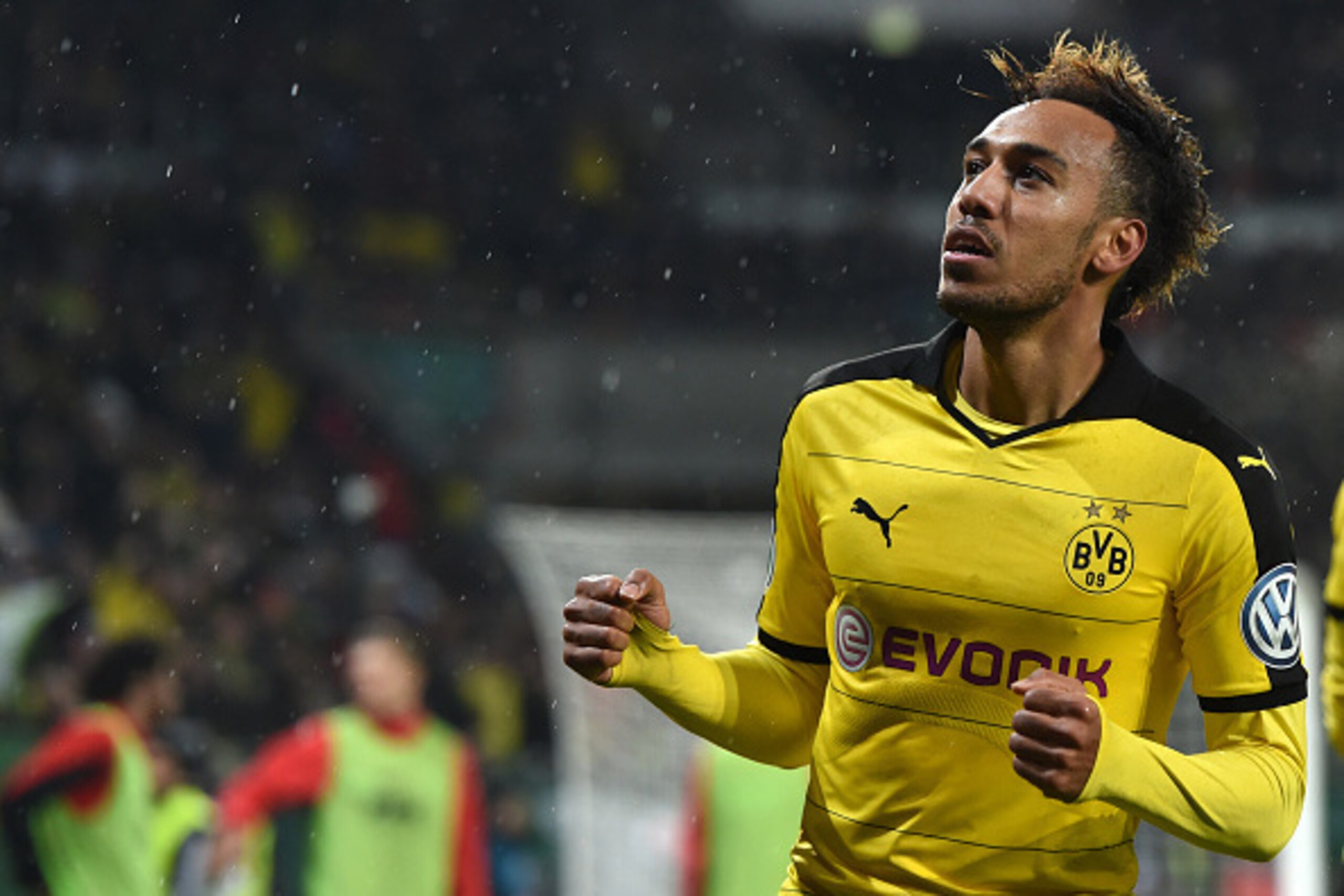 Dortmund's Gabonese striker Pierre-Emerick Aubameyang celebrates after his goal during the German Cup DFB Pokal third round match between Borussia Dortmund and FC Augsburg in Augsburg on December 16, 2015.  / AFP / Christof STACHE / RESTRICTIONS: ACCORDIN