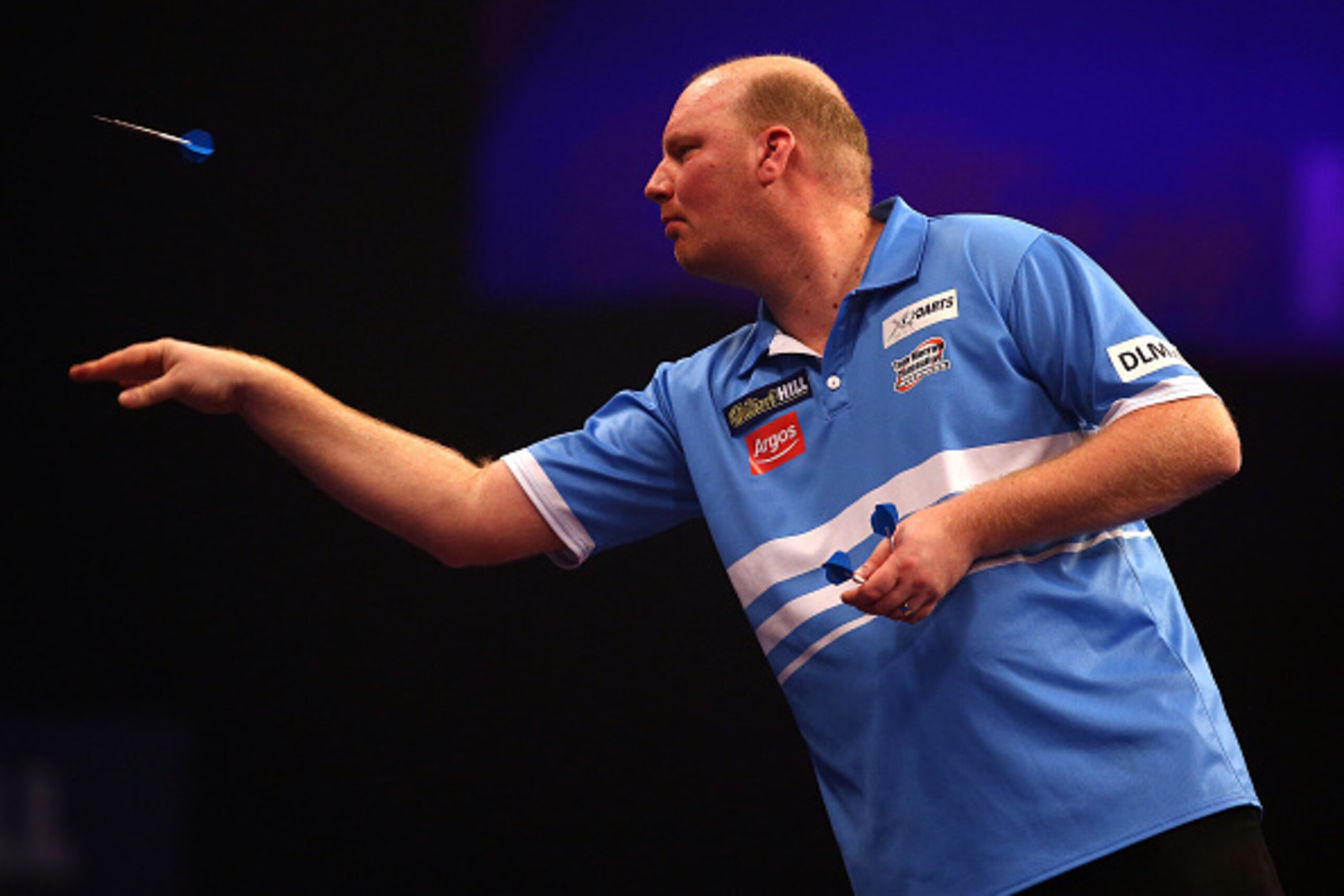 LONDON, ENGLAND - DECEMBER 30: Vincent van der Voort of Holland in action during his third round match against  Dean Winstanley of England during the William Hill PDC World Darts Championships on Day Ten at Alexandra Palace on December 30, 2014 in London,