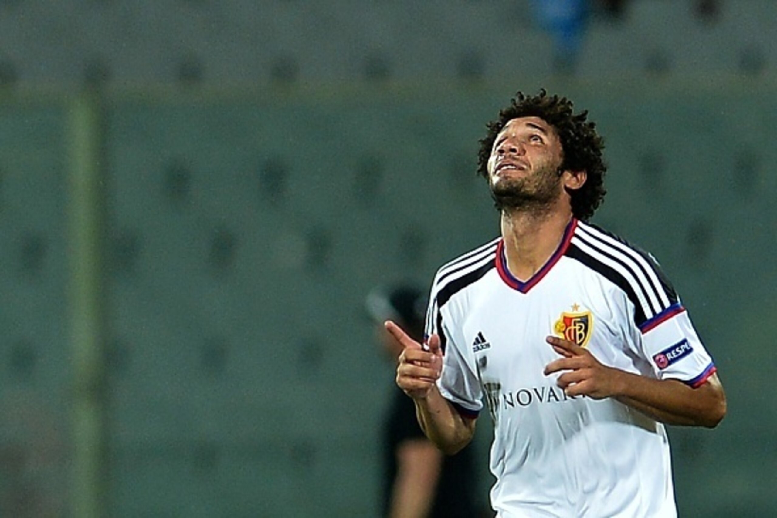 Basel's midfielder Mohamed Elneny celebrates after scoring during the UEFA Europa League football match between Fiorentina and Basel on September 17, 2015, at the Artemio Franchi Stadium in Florence.  AFP PHOTO / TIZIANA FABI        (Photo credit should r