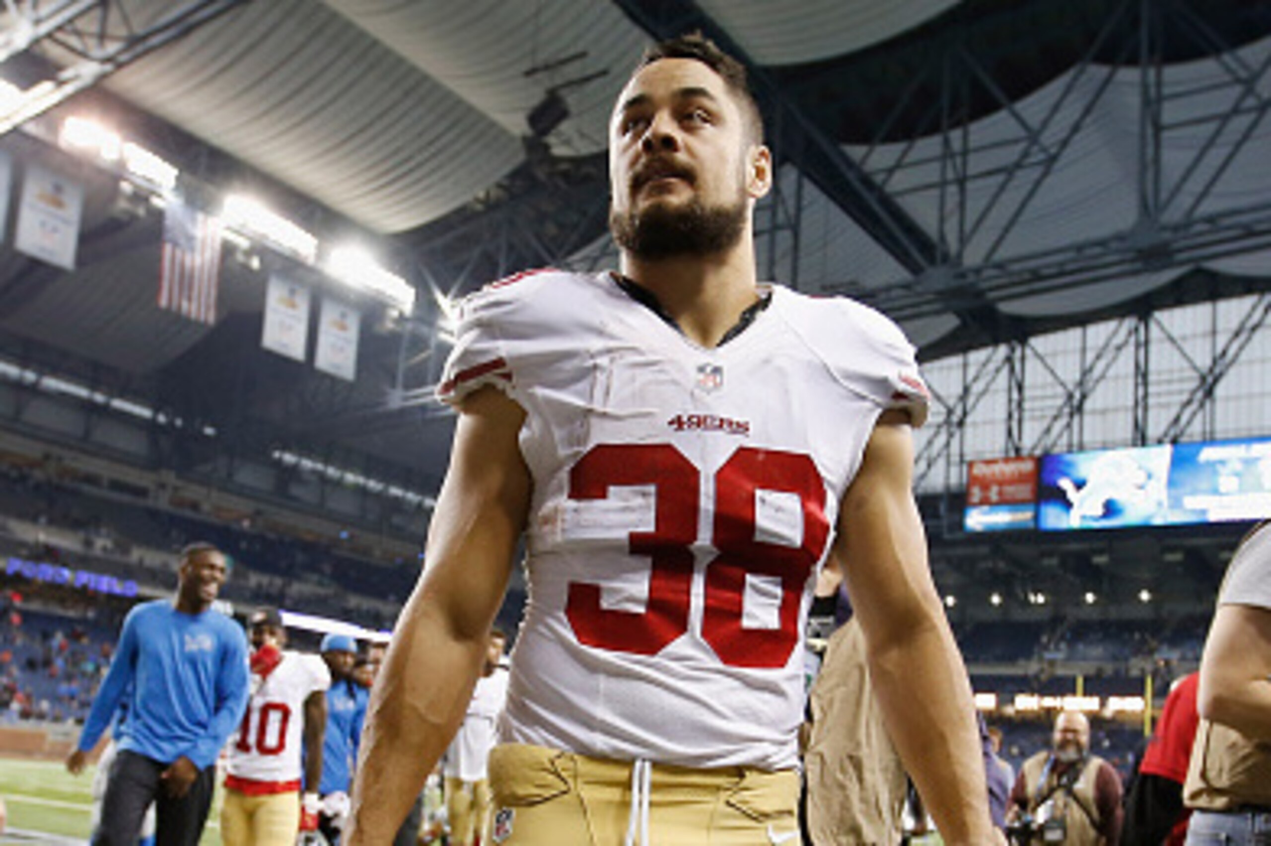 DETROIT, MI - DECEMBER 27: Jarryd Hayne #38 of the San Francisco 49ers walks off the field after losing 17-32 to the Detroit Lions at Ford Field on December 27, 2015 in Detroit, Michigan. (Photo by Gregory Shamus/Getty Images)