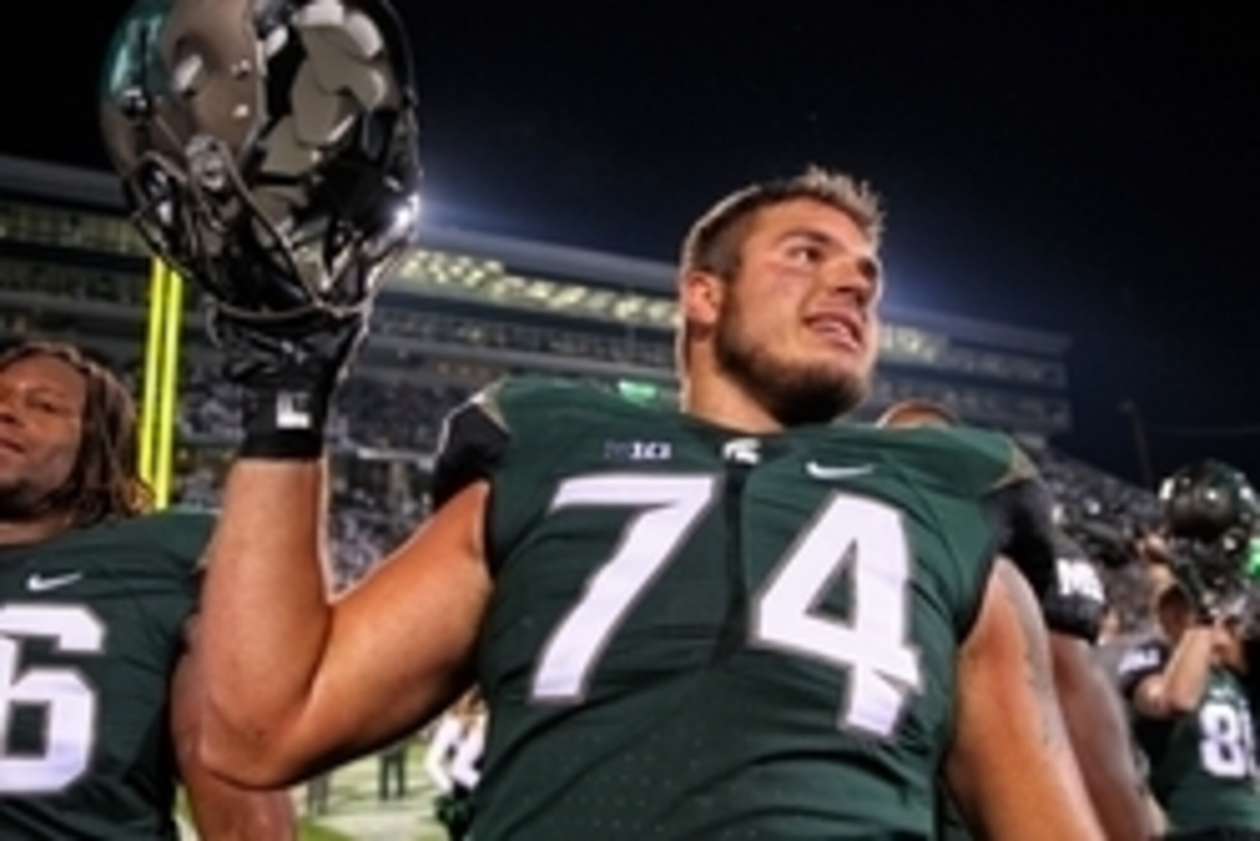 Sep 12, 2015; East Lansing, MI, USA; Michigan State Spartans offensive tackle Jack Conklin (74) celebrates the win over the Oregon Ducks after a game at Spartan Stadium. MSU won 31-28. Mandatory Credit: Mike Carter-USA TODAY Sports
