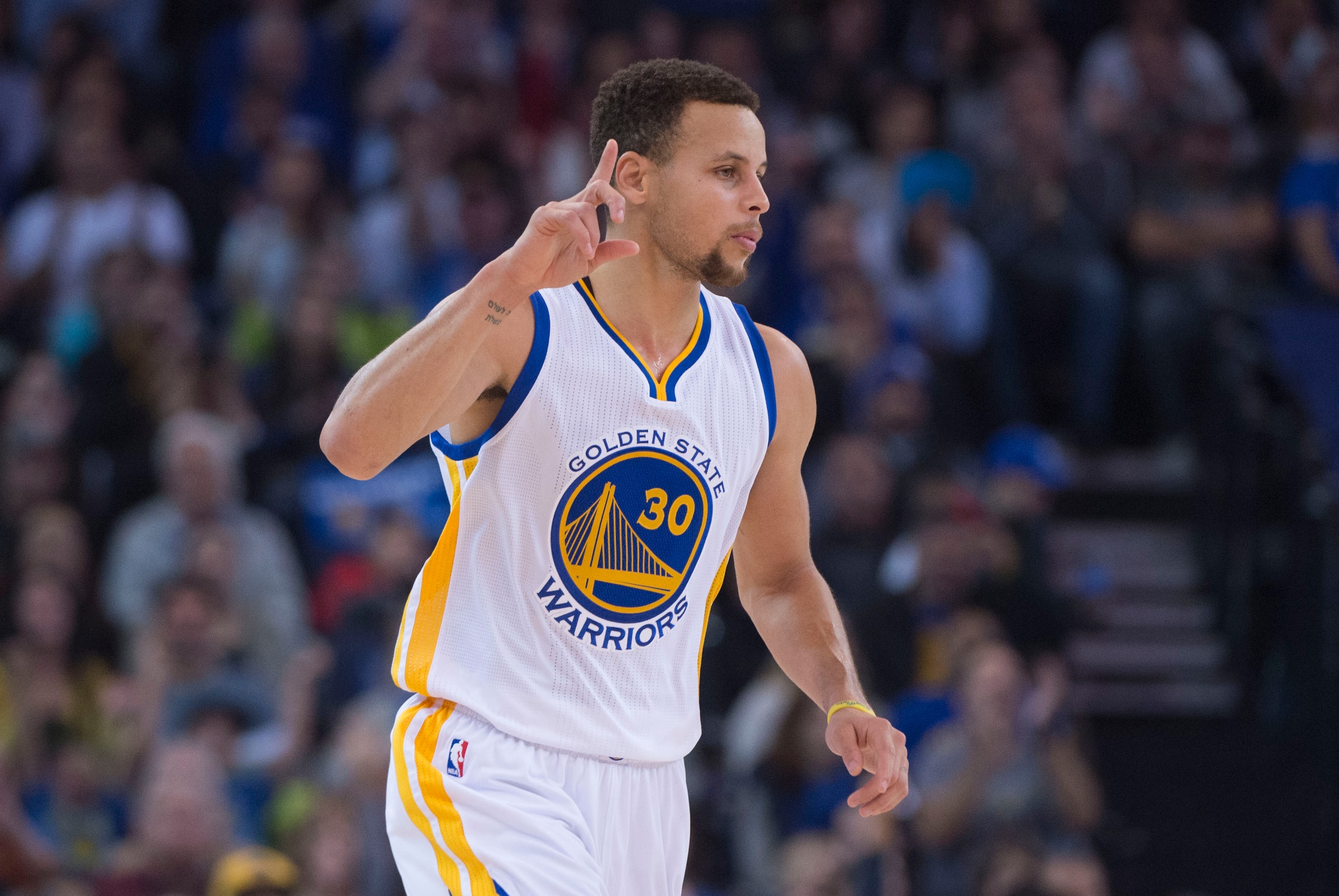 December 18, 2015; Oakland, CA, USA; Golden State Warriors guard Stephen Curry (30) celebrates during the first quarter against the Milwaukee Bucks at Oracle Arena. Mandatory Credit: Kyle Terada-USA TODAY Sports
