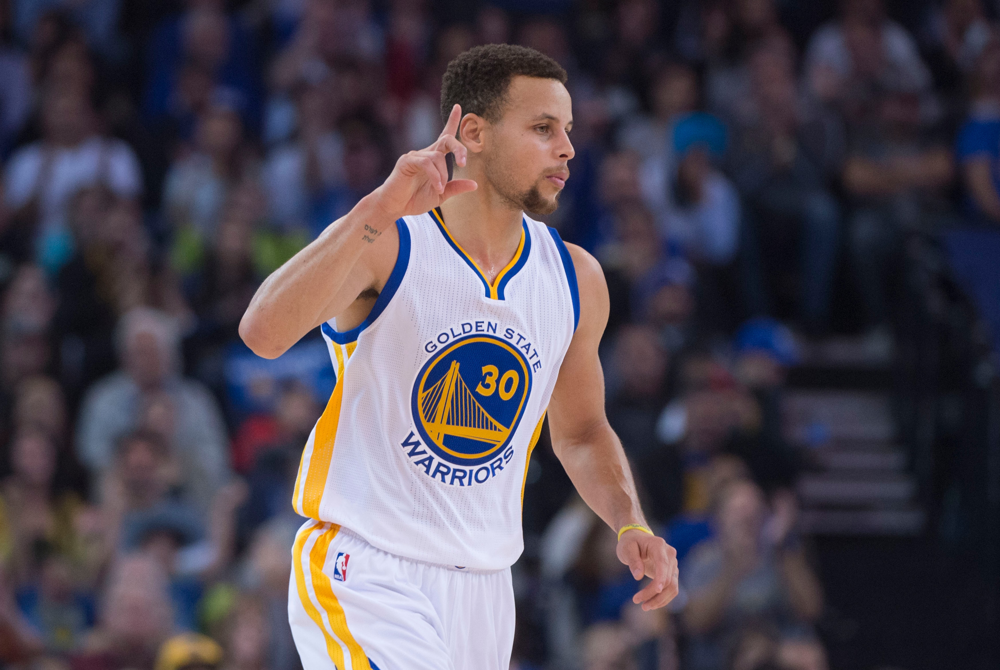 December 18, 2015; Oakland, CA, USA; Golden State Warriors guard Stephen Curry (30) celebrates during the first quarter against the Milwaukee Bucks at Oracle Arena. Mandatory Credit: Kyle Terada-USA TODAY Sports