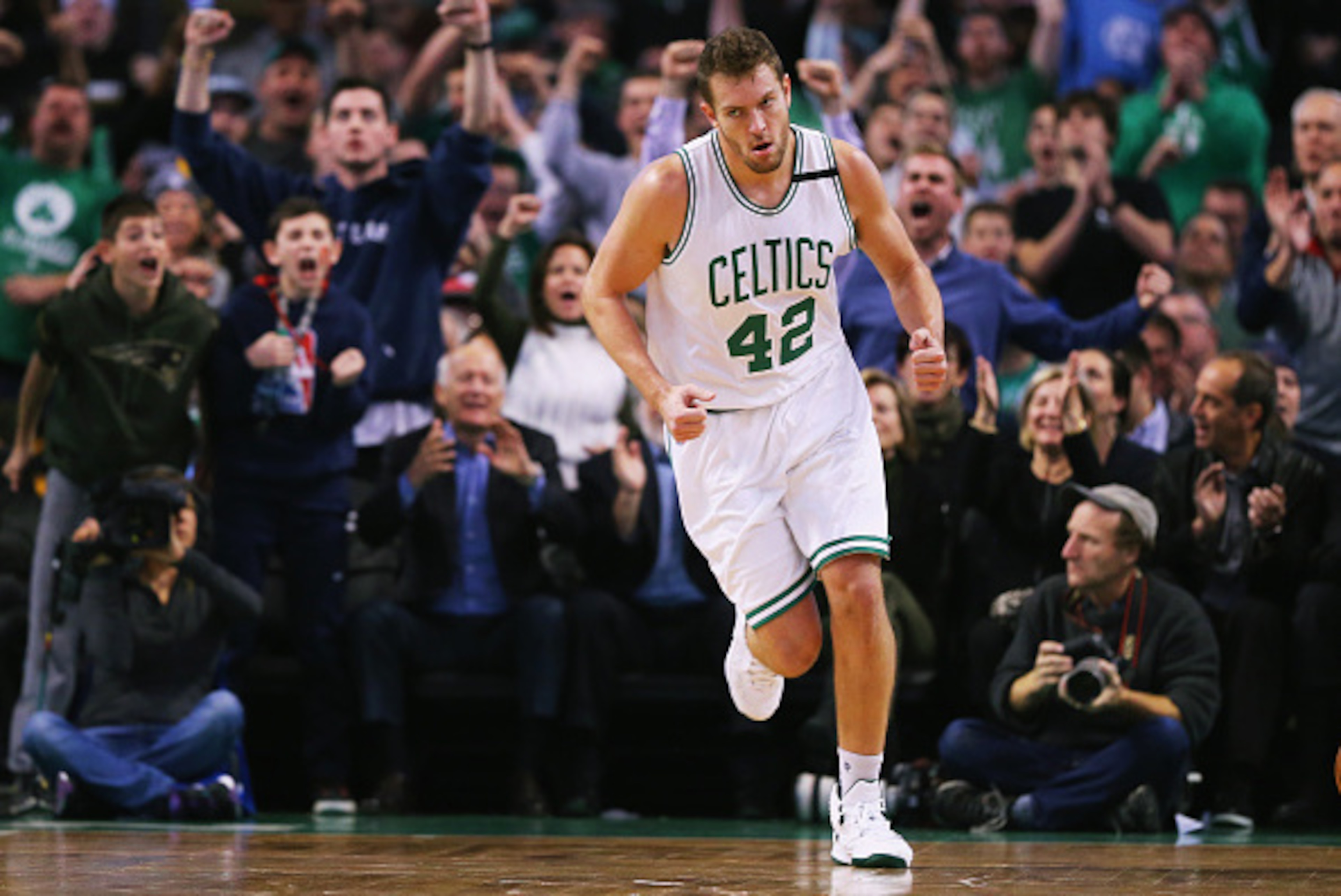 BOSTON, MA - DECEMBER 09: David Lee #42 of the Boston Celtics reacts after scoring against the Chicago Bulls during the second half at TD Garden on December 9, 2015 in Boston, Massachusetts. The Celtics defeat the Bulls 105-100.  (Photo by Maddie Meyer/Ge