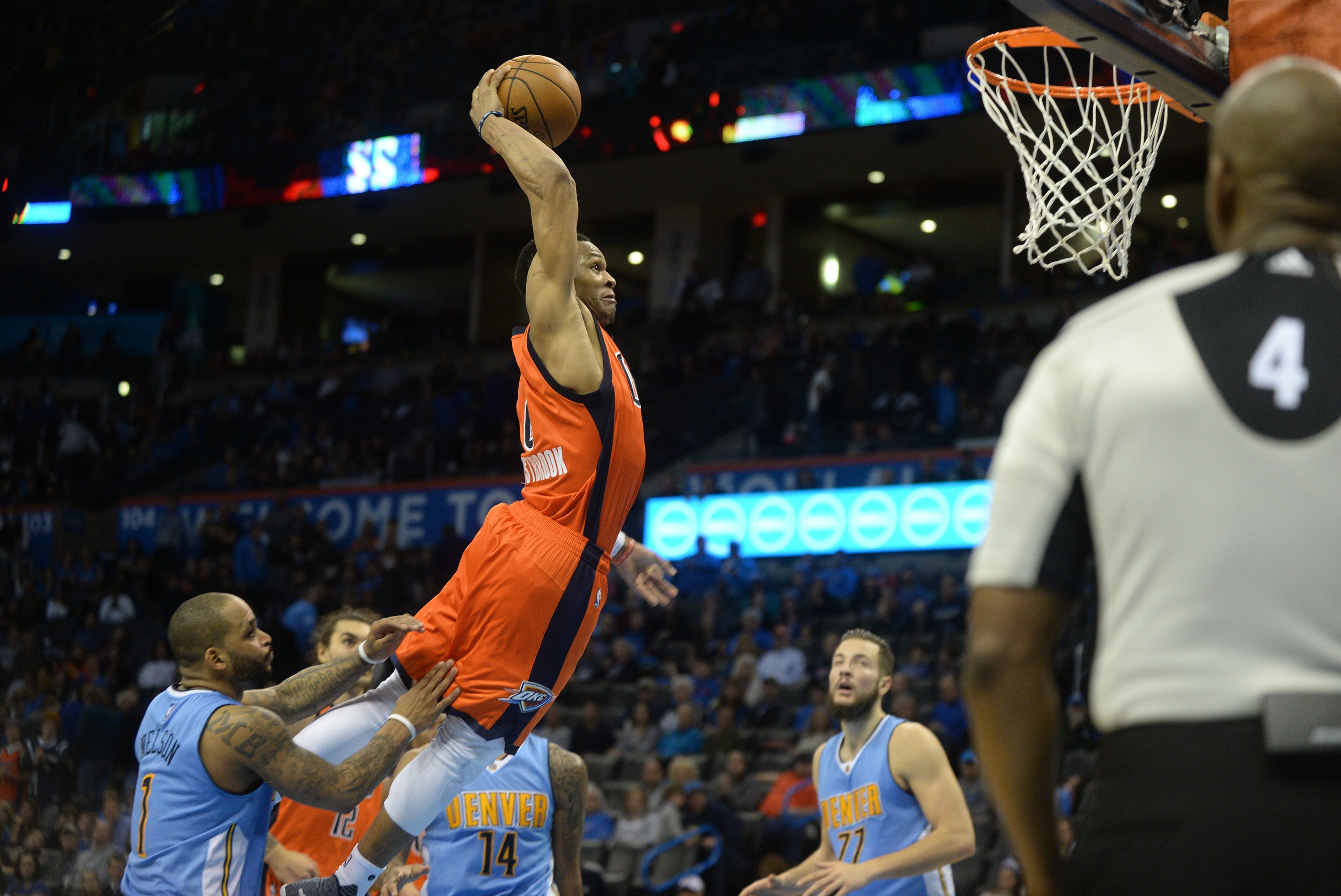 Dec 27, 2015; Oklahoma City, OK, USA; Oklahoma City Thunder guard Russell Westbrook (0) dunks the ball against the Denver Nuggets during the fourth quarter at Chesapeake Energy Arena. Mandatory Credit: Mark D. Smith-USA TODAY Sports