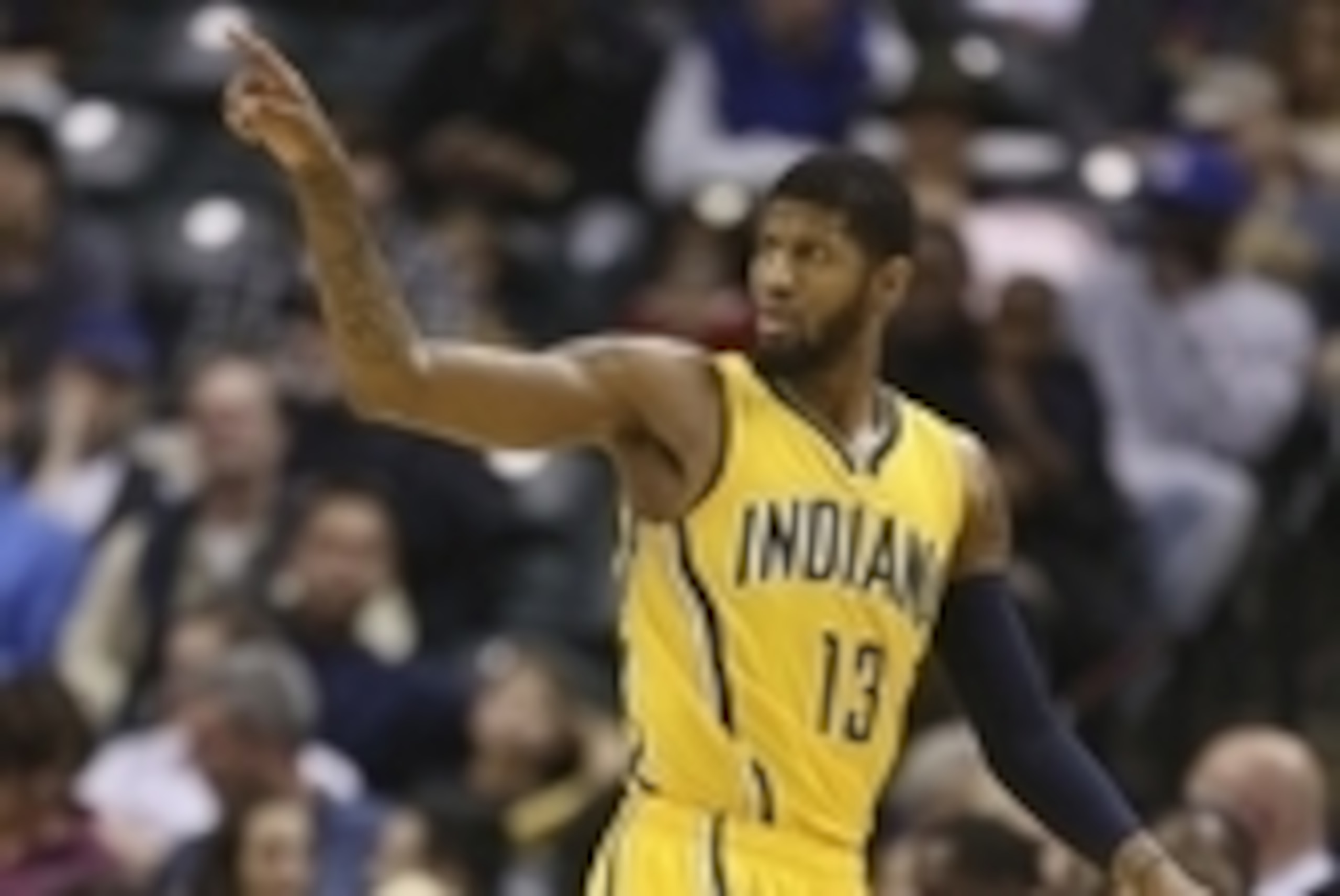 Dec 16, 2015; Indianapolis, IN, USA; Indiana Pacers forward Paul George (13) points to his team during a game against the Dallas Mavericks at Bankers Life Fieldhouse. Indiana defeats Dallas 107-81. Mandatory Credit: Brian Spurlock-USA TODAY Sports