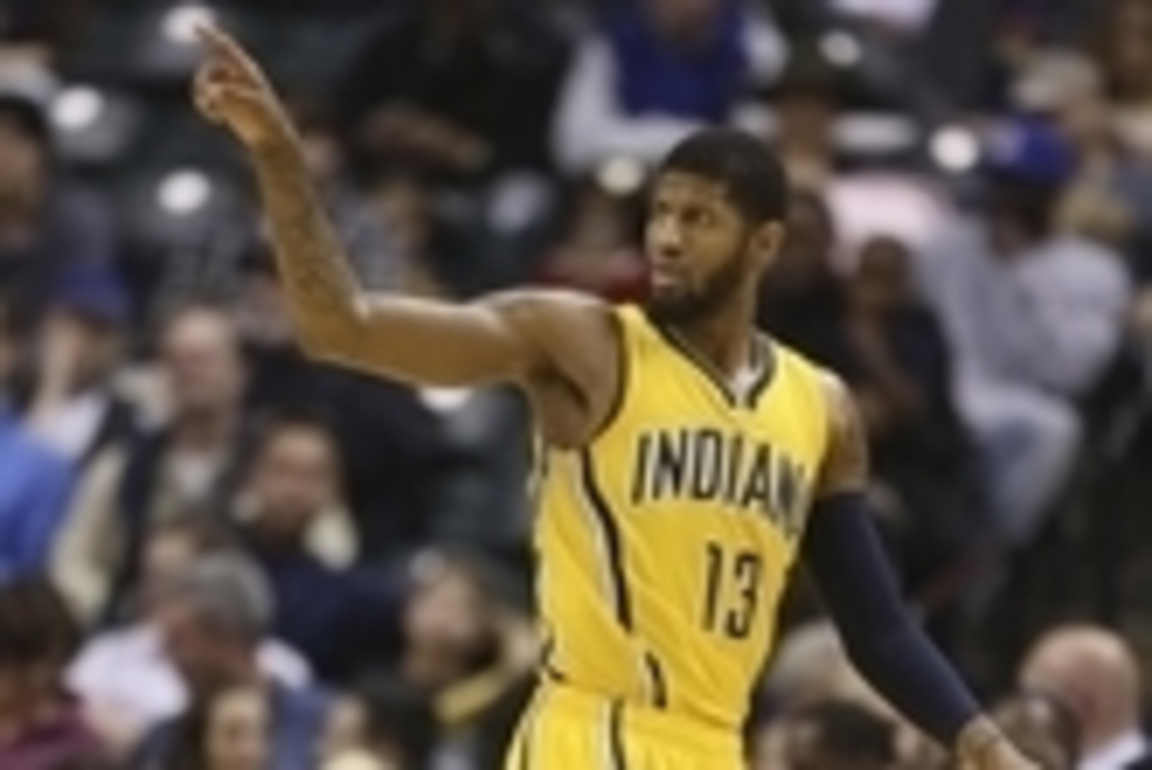 Dec 16, 2015; Indianapolis, IN, USA; Indiana Pacers forward Paul George (13) points to his team during a game against the Dallas Mavericks at Bankers Life Fieldhouse. Indiana defeats Dallas 107-81. Mandatory Credit: Brian Spurlock-USA TODAY Sports