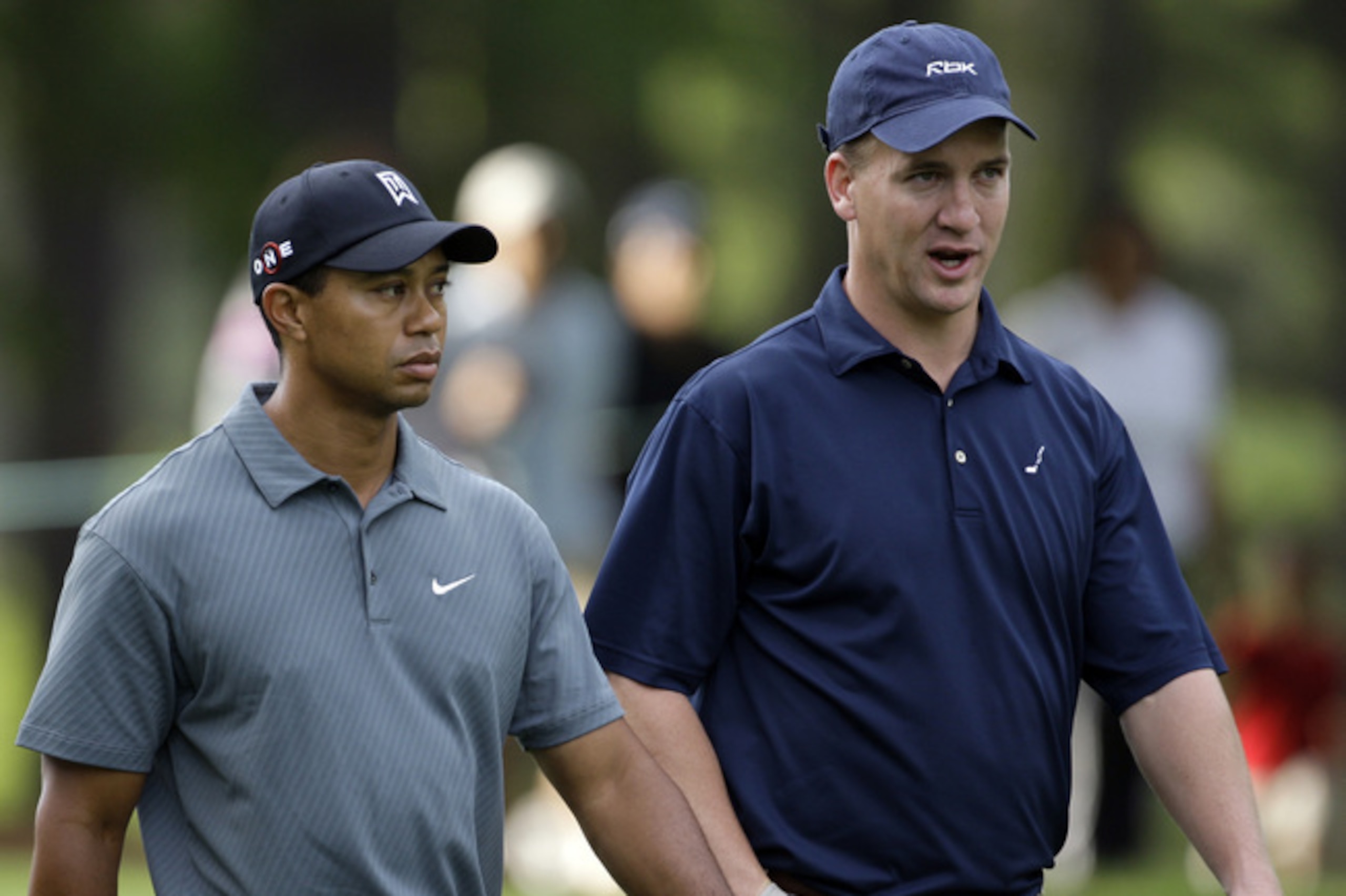 Tiger Woods and Manning Tiger Woods and Manning