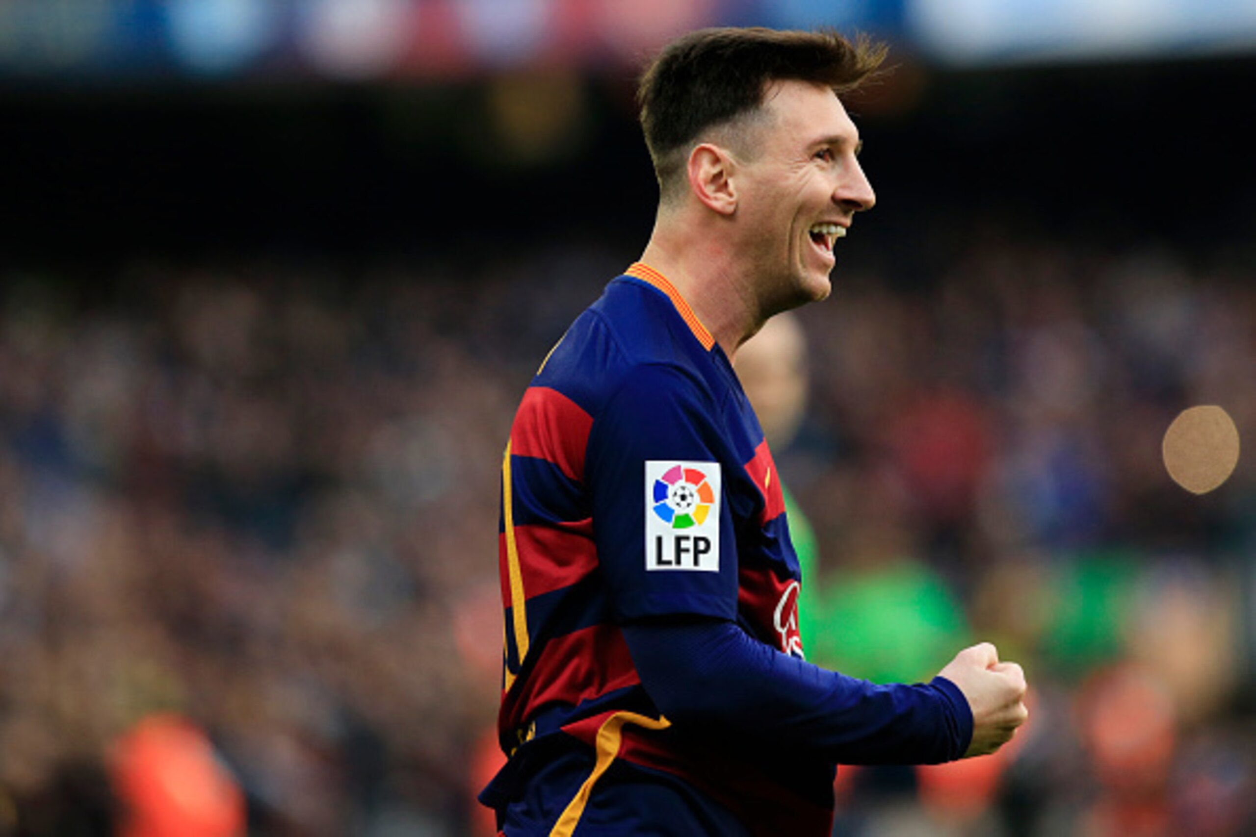 FC Barcelona's Argentinian forward Lionel Messi celebrates a goal during the Spanish league football match FC Barcelona vs Deportivo de La Coruna at the Camp Nou stadium in Barcelona on December 12, 2015. AFP PHOTO/ PAU BARRENA / AFP / PAU BARRENA        
