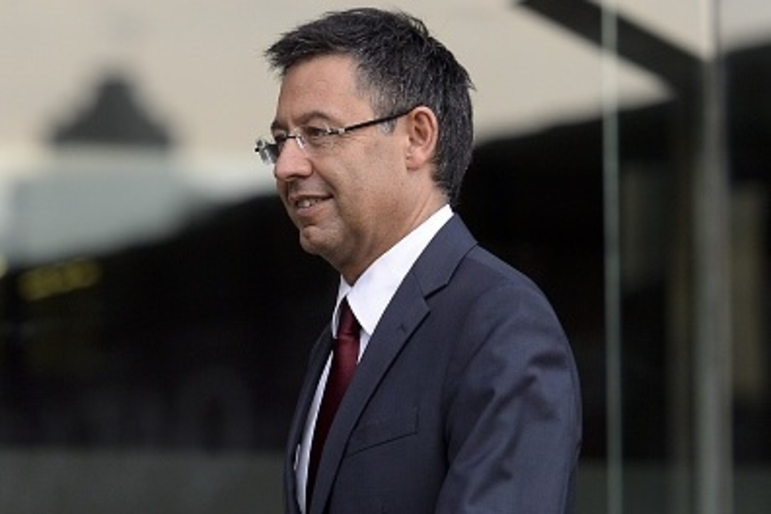 FC Barcelona incumbent president Josep Maria Bartomeu arrives to take office as president in Barcelona on July 20, 2015 after he was re-elected seeing off rival Joan Laporta.  Bartomeu, 52, polled 25,823 votes (54.63%) with Laporta, a former president, wi