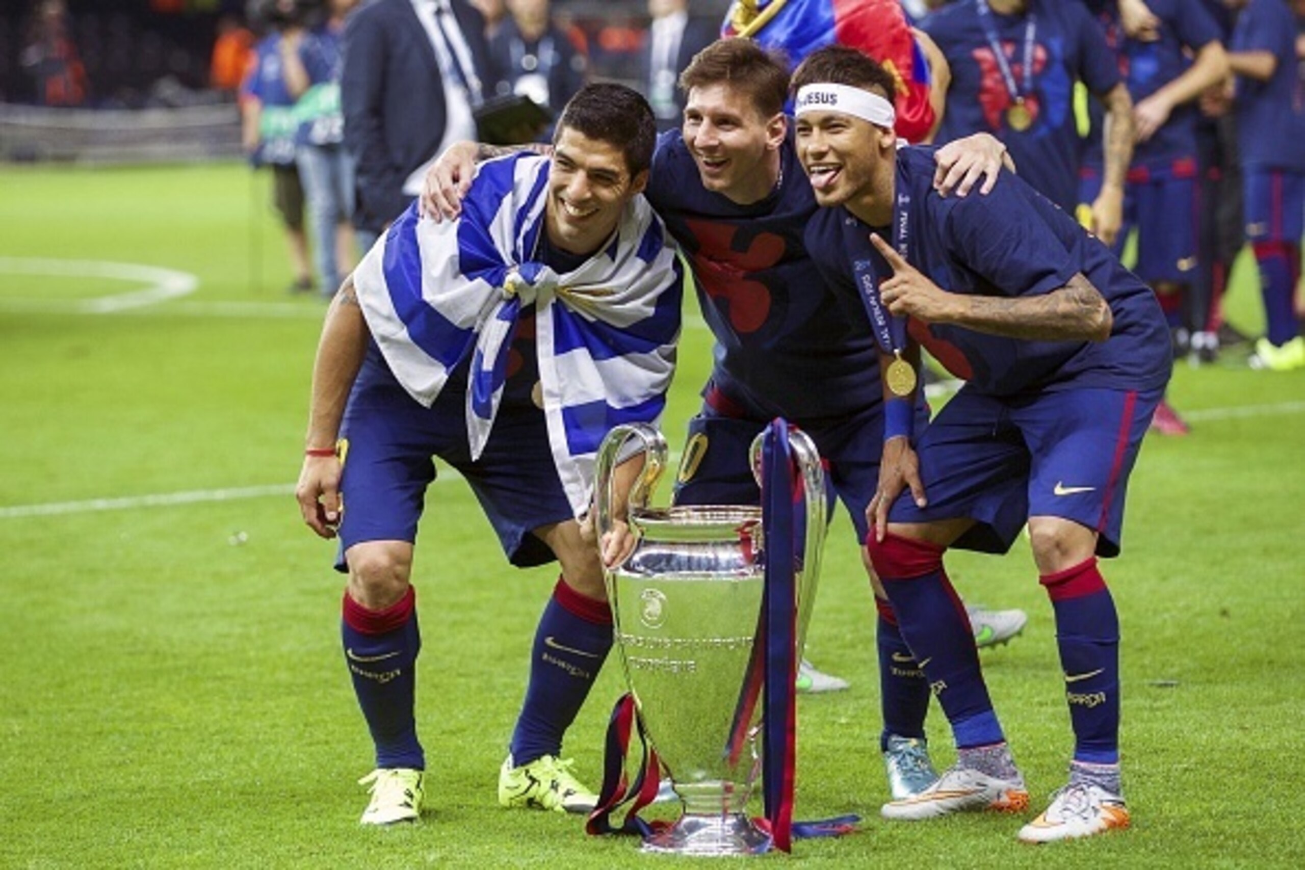 (L-R) Luis Suarez of FC Barcelona, Lionel Messi of FC Barcelona, Neymar of FC Barcelona with trophy during the UEFA Champions League  final match between Barcelona and Juventus on June 6, 2015 at the Olympic stadium in Berlin, Germany.(Photo by VI Images 
