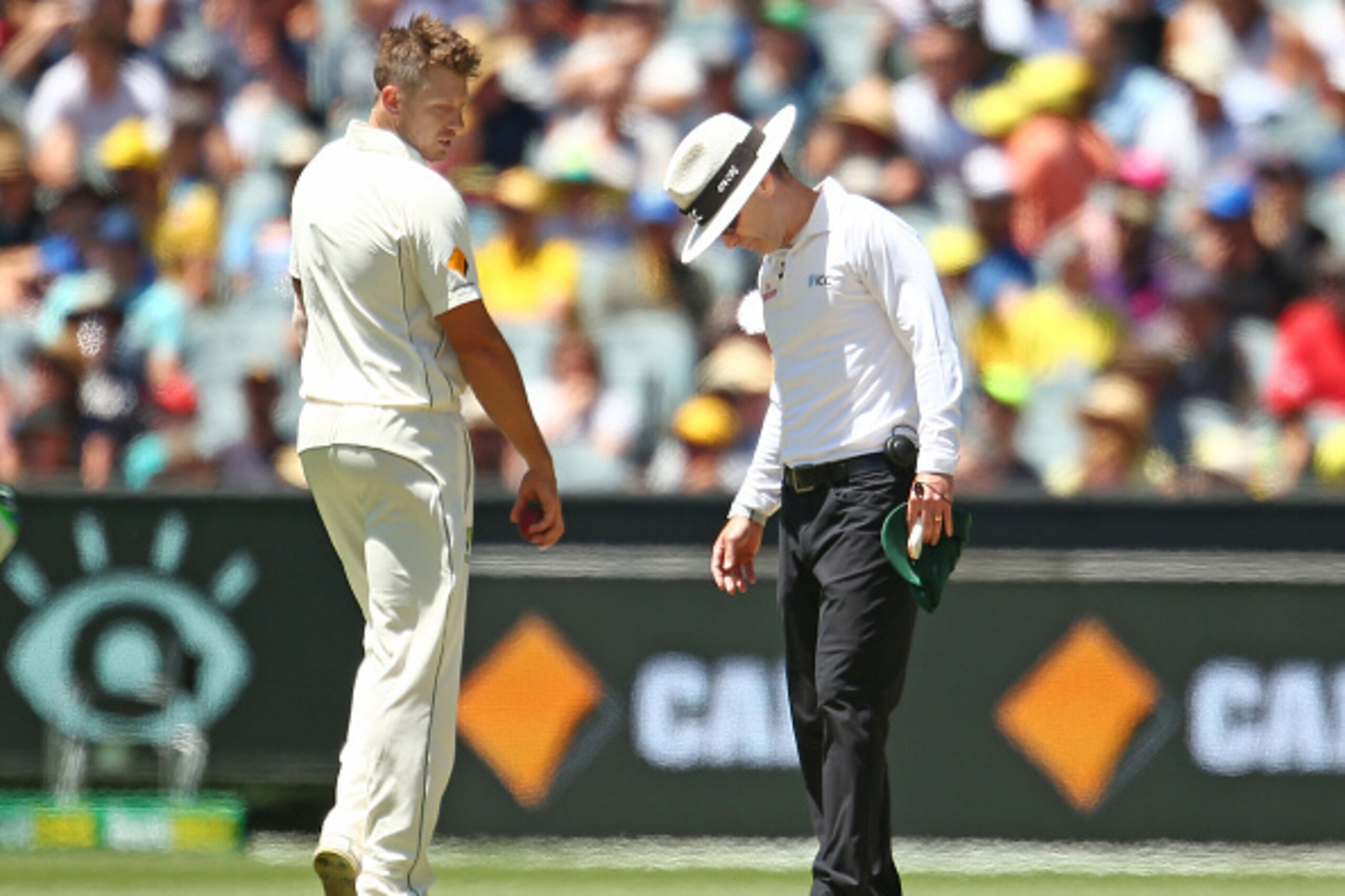 MELBOURNE, AUSTRALIA - DECEMBER 28:  James Pattinson of Australia looks towards umpire Chris Gaffaney after he dismissed Carlos Brathwaite of the West Indies but the delivery was ruled a no-ball for the second time during day three of the Second Test matc