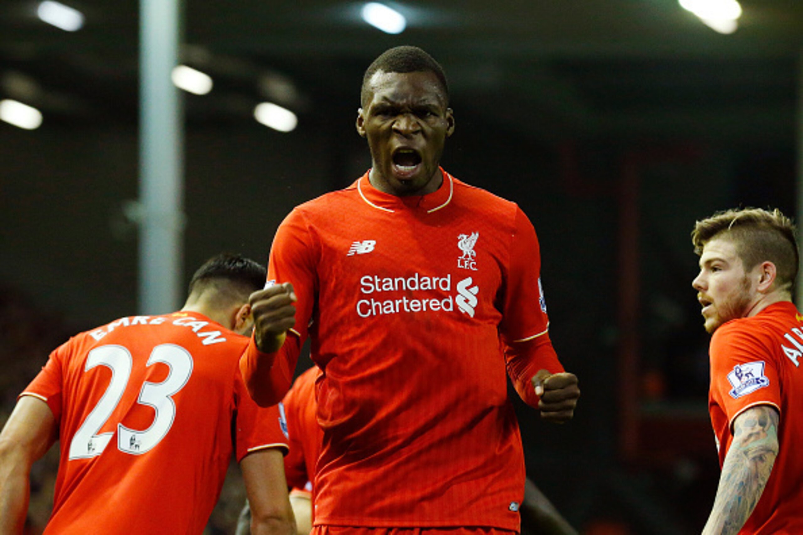 Liverpool's Zaire-born Belgian striker Christian Benteke (C) celebrates scoring the opening goal of during the English Premier League football match between Liverpool and Leicester City at the Anfield stadium in Liverpool, north-west England on December 2
