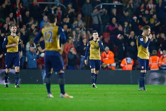 SOUTHAMPTON, ENGLAND - DECEMBER 26:  Central defenders Per Mertesacker (L) and Laurent Koscielny of Arsenal (2R) look dejected during the Barclays Premier League match between Southampton and Arsenal at St Mary's Stadium on December 26, 2015 in Southampto