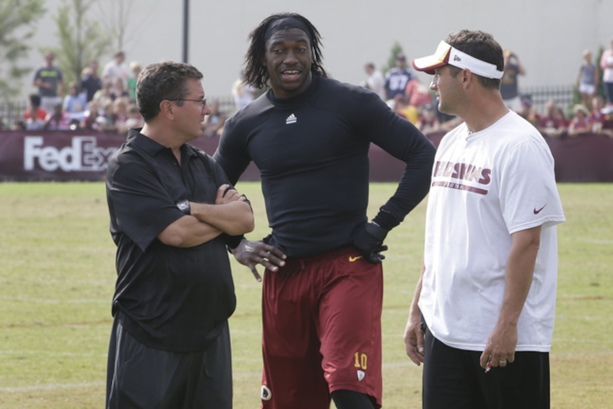Gruden convinced RG3's biggest fan, owner Dan Snyder (L), his team would be better with a different QB. Gruden convinced RG3's biggest fan, owner Dan Snyder (L), his team would be better with a different QB.