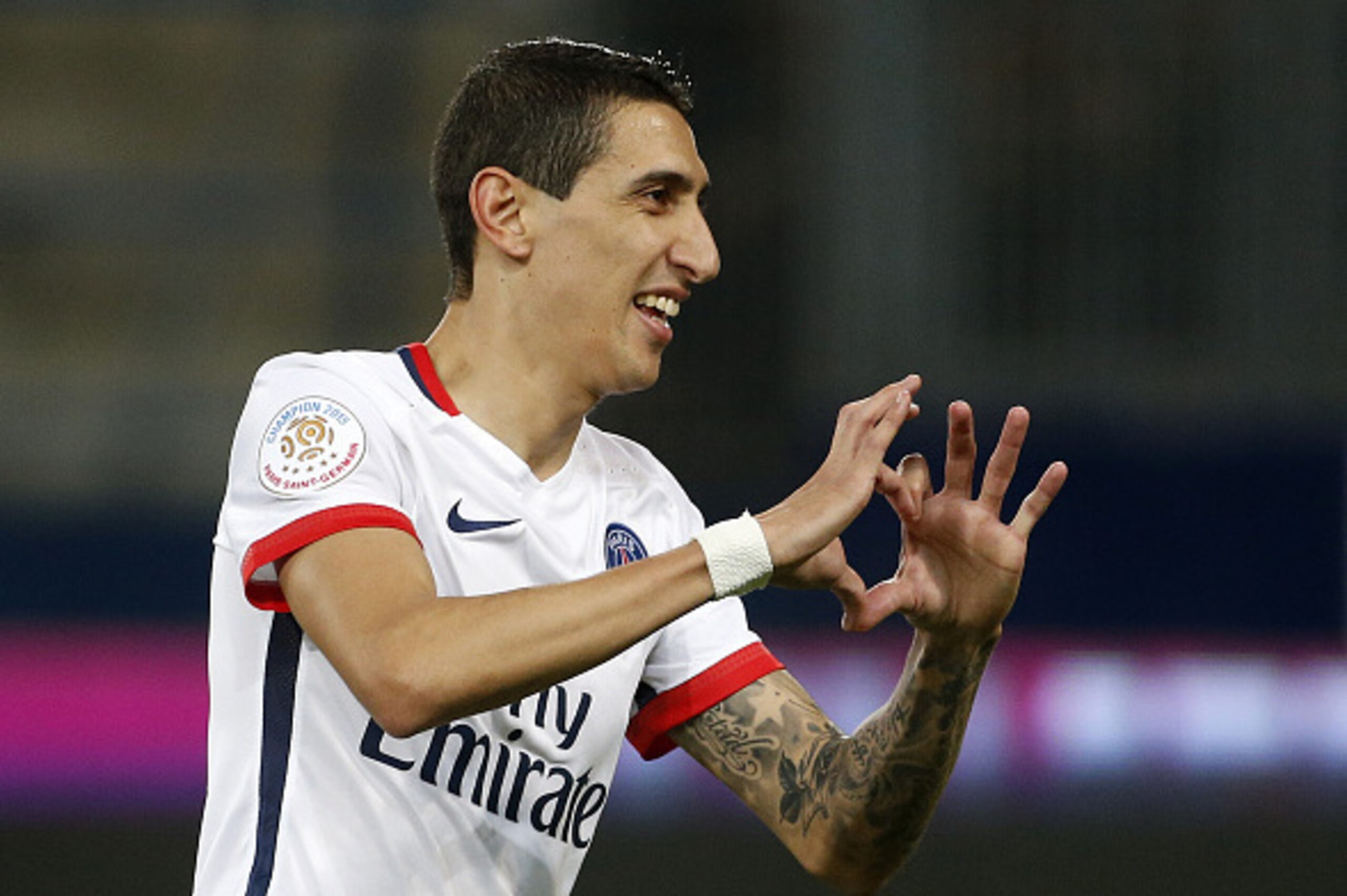 CAEN, FRANCE - DECEMBER 19: Angel Di Maria of PSG celebrates his first goal during the French Ligue 1 match between Stade Malherbe de Caen and Paris Saint-Germain (PSG) at Stade Michel D'Ornano on December 19, 2015 in Caen, France. (Photo by Jean Catuffe/