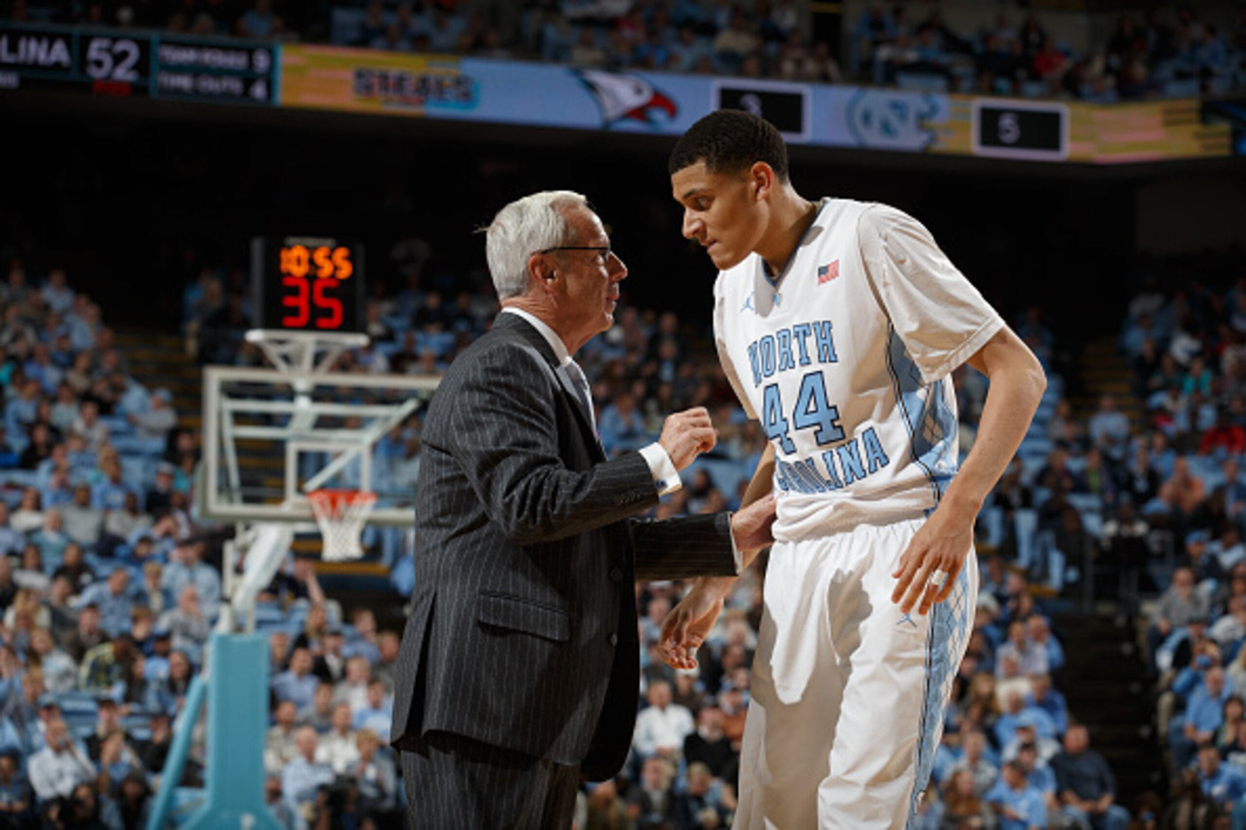 CHAPEL HILL, NC - NOVEMBER 14: Head coach Roy Williams of the North Carolina Tar Heels coaches Justin Jackson #44 during a game against the North Carolina Central Eagles on November 14, 2014 at the Dean E. Smith Center in Chapel Hill, North Carolina. Nort