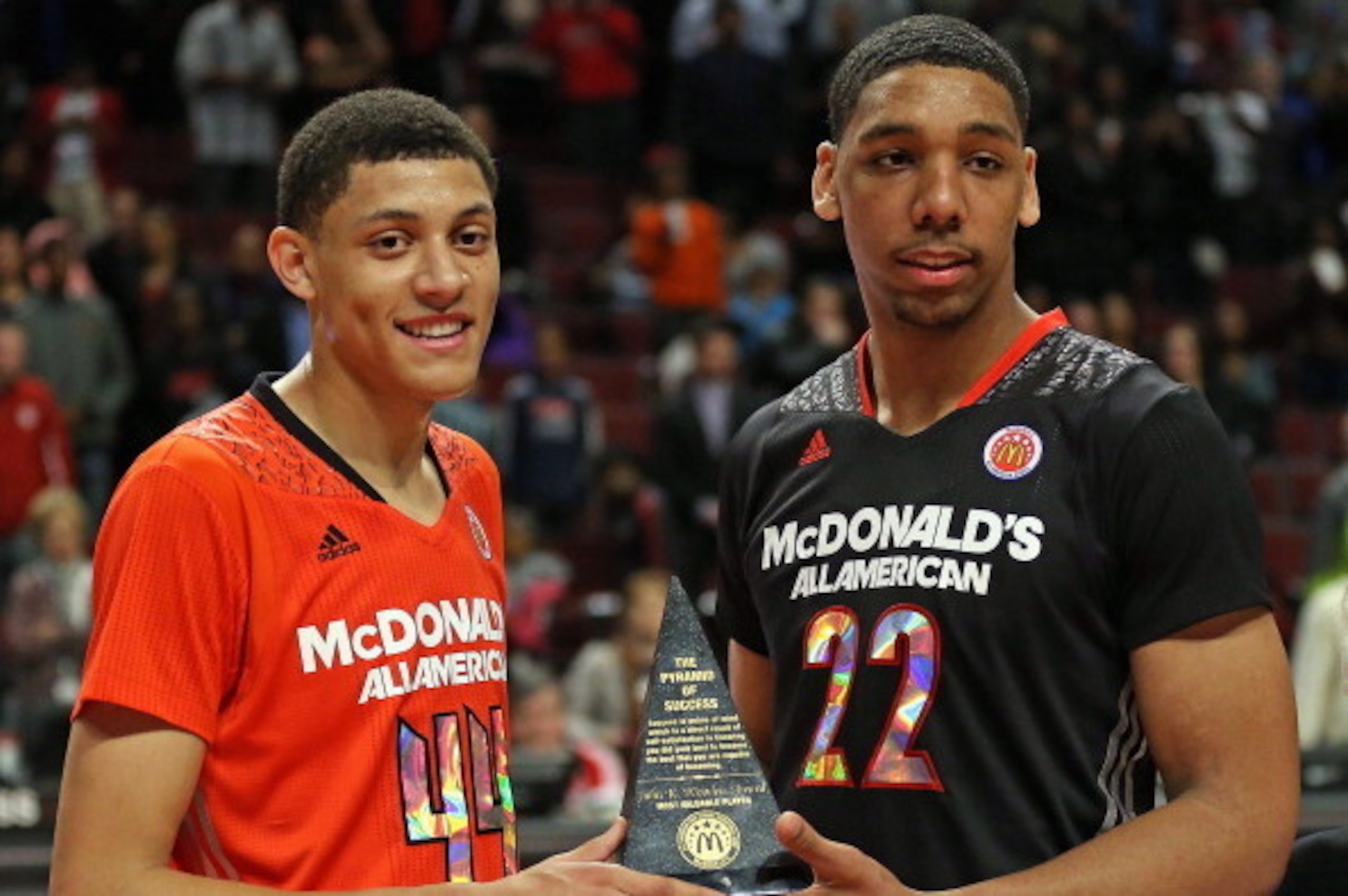 CHICAGO, IL - APRIL 2: Justin Jackson #44 of the East team and Jahlil Okafor #22 of the West team share the MVP torphy after the 2014 McDonald's All American Game at United Center on April 2, 2014 in Chicago, Illinois. The West defeated the East 105-102. 