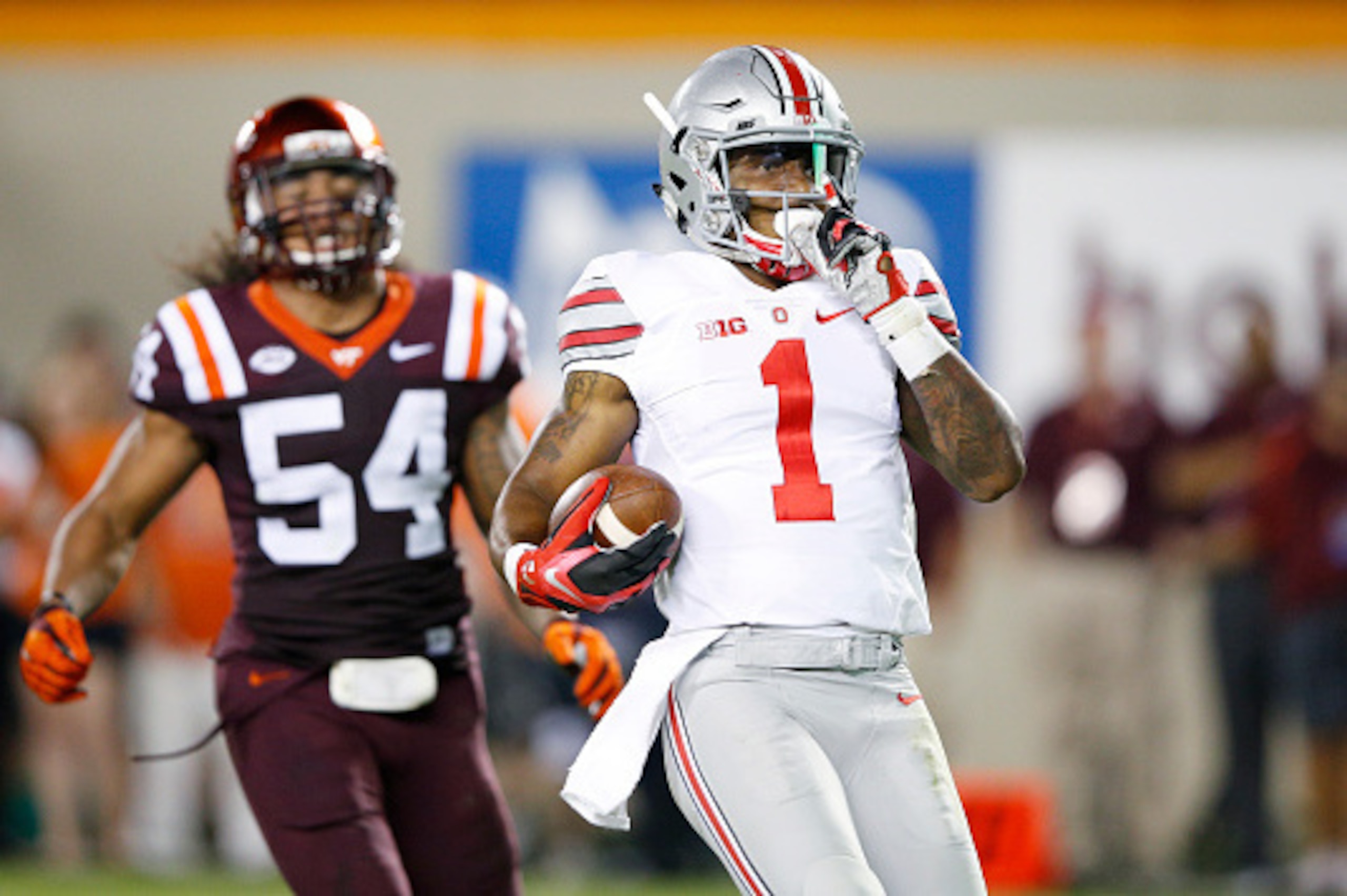 BLACKSBURG, VA - SEPTEMBER 7: Braxton Miller #1 of the Ohio State Buckeyes runs for a 53-yard touchdown in the third quarter against the Virginia Tech Hokies at Lane Stadium on September 7, 2015 in Blacksburg, Virginia. Ohio State defeated Virginia Tech 4