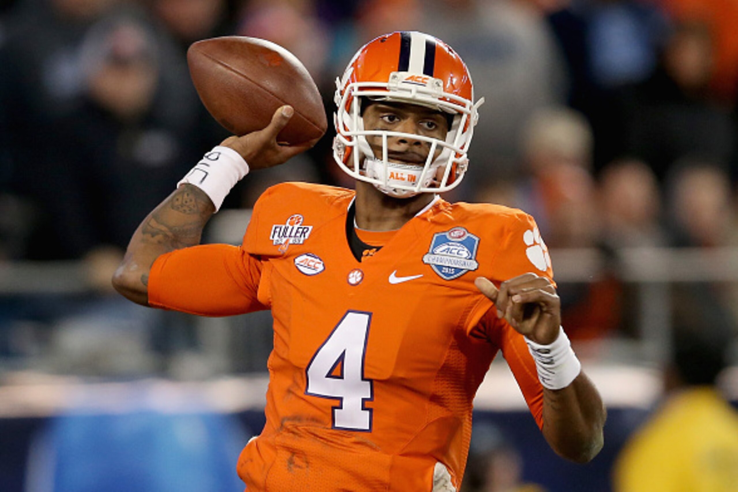 CHARLOTTE, NC - DECEMBER 05:  Deshaun Watson #4 of the Clemson Tigers drops back to pass against the North Carolina Tar Heels during the Atlantic Coast Conference Football Championship at Bank of America Stadium on December 5, 2015 in Charlotte, North Car
