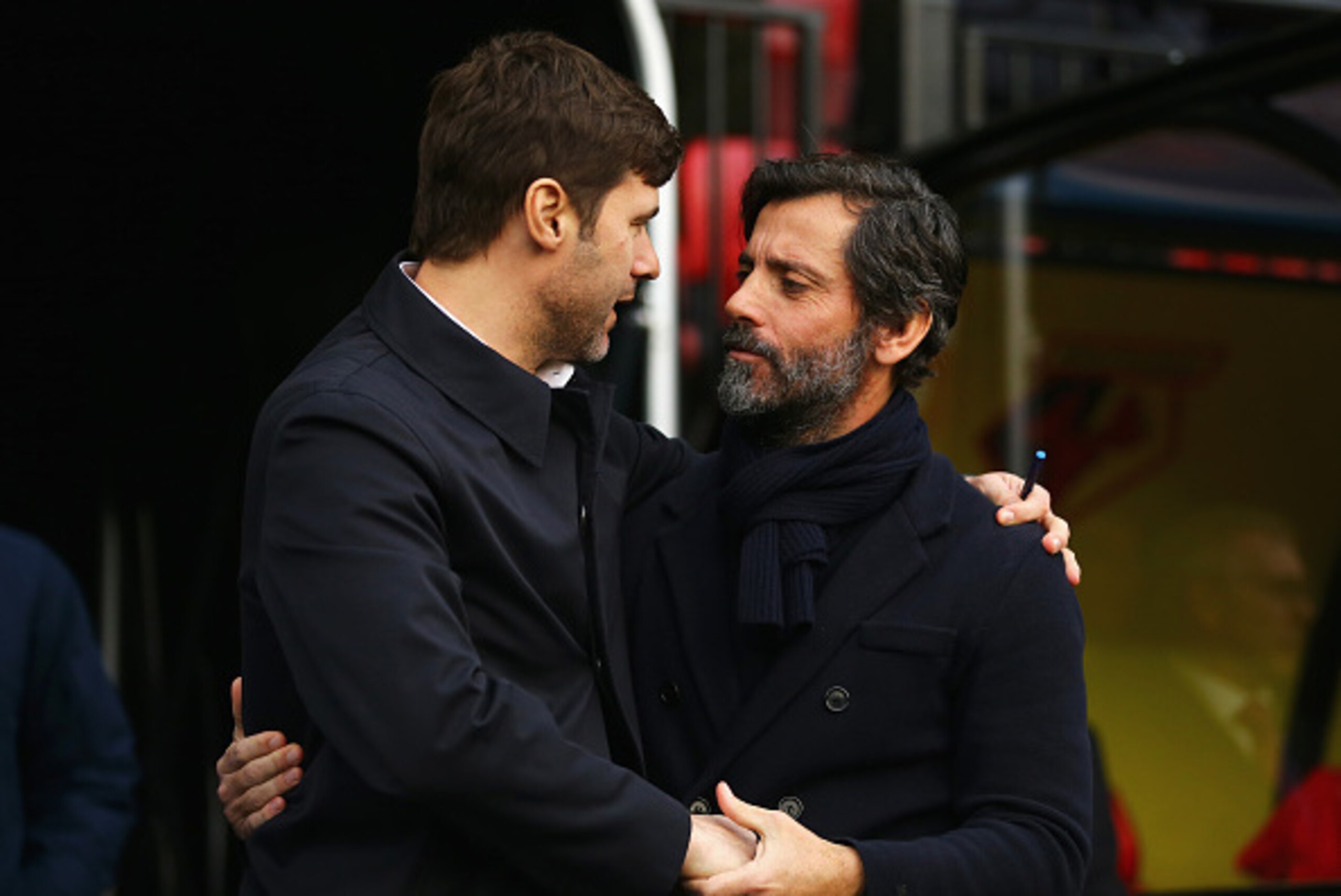 WATFORD, ENGLAND - DECEMBER 28: Mauricio Pochettino Manager of Tottenham Hotspur and Quique Flores manager of Watford greet prior to the Barclays Premier League match between Watford and Tottenham Hotspur at Vicarage Road on December 28, 2015 in Watford, 