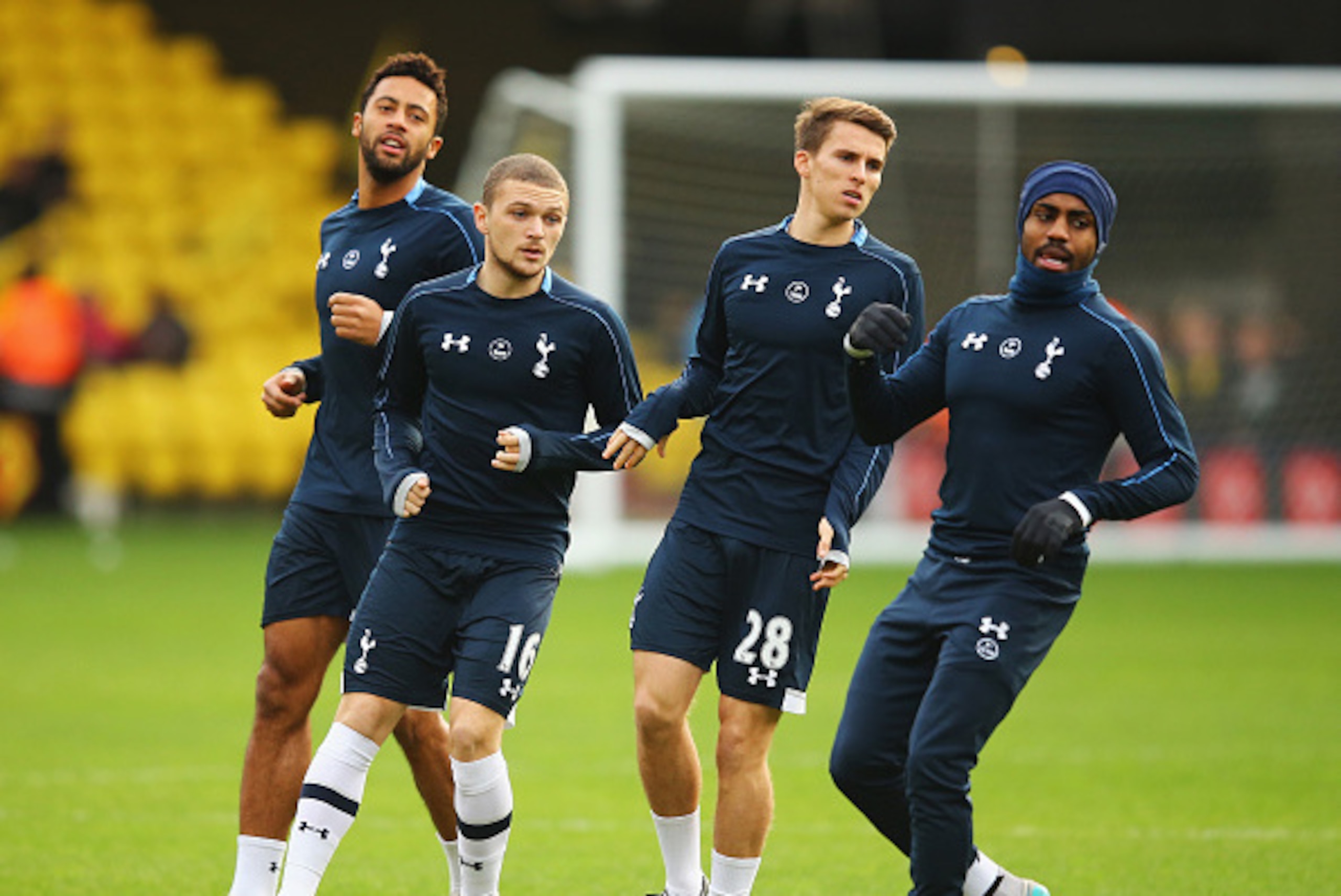 WATFORD, ENGLAND - DECEMBER 28: (L to R) Mousa Dembele, Kieran Trippier, Tom Carroll and Danny Rose of Tottenham Hotspur warm up prior to the Barclays Premier League match between Watford and Tottenham Hotspur at Vicarage Road on December 28, 2015 in Watf