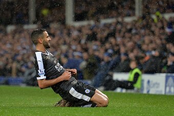 Leicester City's Algerian midfielder Riyad Mahrez celebrates after scoring their second goal during the English Premier League football match between Everton and Leicester City at Goodison Park in Liverpool, north west England on December 19, 2015. AFP PH