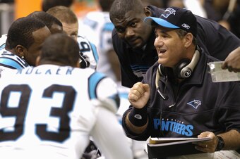NEW ORLEANS - DECEMBER 5:  Defensive line coach Sal Sunseri of the Carolina Panthers talks with his players on the sideline during the game against the New Orleans Saints at the Louisiana Superdome on December 5, 2004 in New Orleans, Louisiana.  The Panth