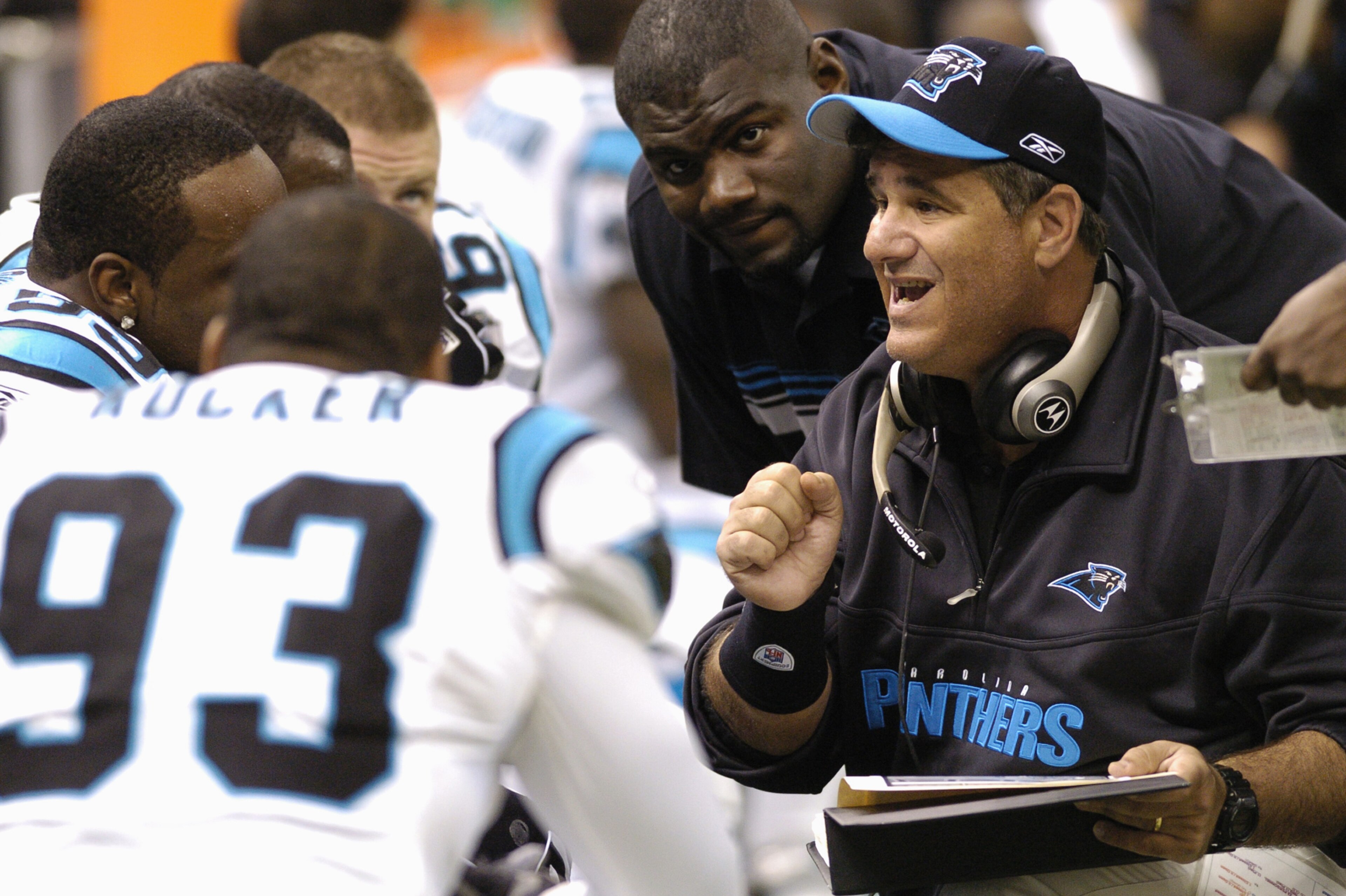 NEW ORLEANS - DECEMBER 5: Defensive line coach Sal Sunseri of the Carolina Panthers talks with his players on the sideline during the game against the New Orleans Saints at the Louisiana Superdome on December 5, 2004 in New Orleans, Louisiana. The Panth NEW ORLEANS - DECEMBER 5: Defensive line coach Sal Sunseri of the Carolina Panthers talks with his players on the sideline during the game against the New Orleans Saints at the Louisiana Superdome on December 5, 2004 in New Orleans, Louisiana. The Panth
