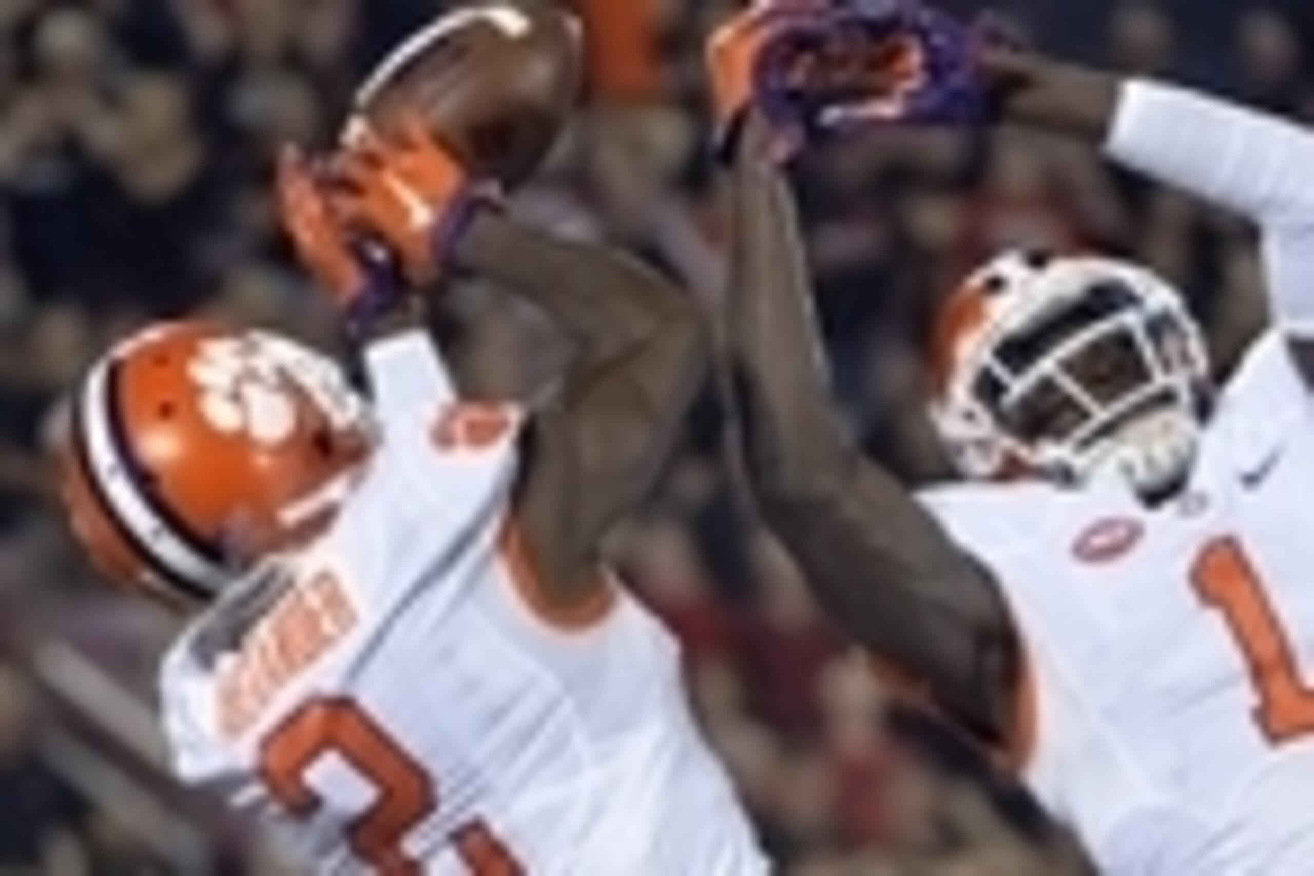 Sep 17, 2015; Louisville, KY, USA; Clemson Tigers cornerback Mackensie Alexander (2) and safety Jayron Kearse (1) battle for a pass intended for Louisville Cardinals wide receiver Traveon Samuel (9) in the finals seconds of the second half at Papa John's 
