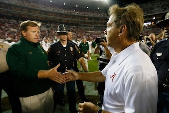 TUSCALOOSA, AL - SEPTEMBER 21:  Head coach Nick Saban of the Alabama Crimson Tide shakes hands with head coach Jim McElwain of the Colorado State Rams after their 31-6 win at Bryant-Denny Stadium on September 21, 2013 in Tuscaloosa, Alabama.  (Photo by Ke