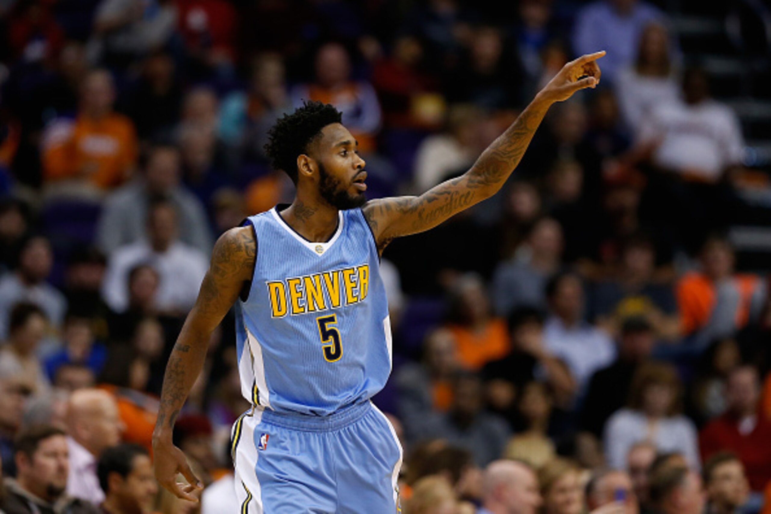 PHOENIX, AZ - DECEMBER 23:  Will Barton #5 of the Denver Nuggets reacts after scoring against the Phoenix Suns during the second half of the NBA game at Talking Stick Resort Arena on December 23, 2015 in Phoenix, Arizona.  The Nuggets defeated the Suns 10