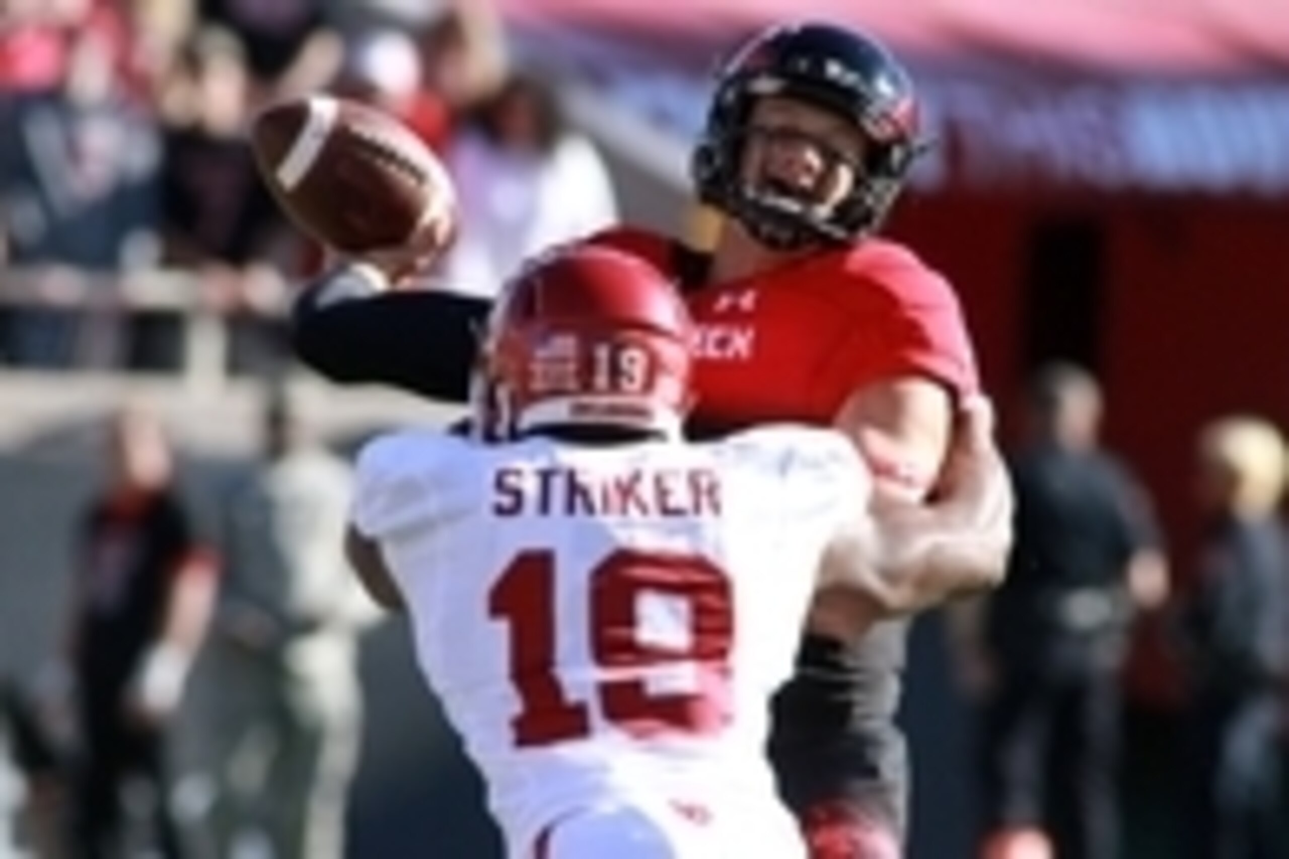 Nov 15, 2014; Lubbock, TX, USA; Oklahoma Sooners defensive end Eric Striker (19) sacks Texas Tech Red Raiders quarterback Patrick Mahomes (5) in the first half at Jones AT&T Stadium. Mandatory Credit: Michael C. Johnson-USA TODAY Sports