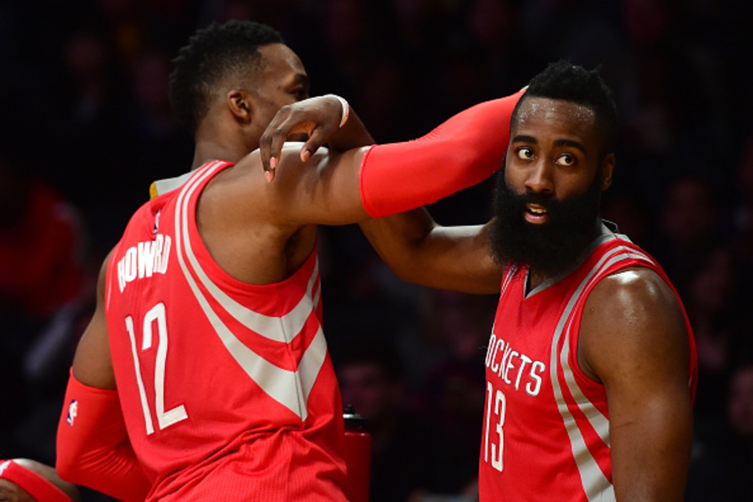LOS ANGELES, CA - DECEMBER 17:  James Harden #13 and Dwight Howard #12 of the Houston Rockets celebrate a 107-87 win over the Los Angeles Lakers at Staples Center on December 17, 2015 in Los Angeles, California.  NOTE TO USER: User expressly acknowledges 
