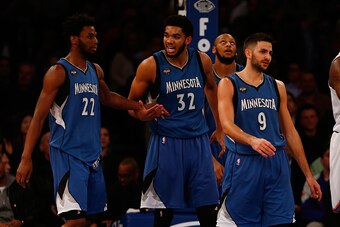 NEW YORK, NY - DECEMBER 16:  Andrew Wiggins #22, Karl-Anthony Towns #32 and Ricky Rubio #9 of the Minnesota Timberwolves look on against the New York Knicks at Madison Square Garden on December 16, 2015 in New York City. The Knicks defeated the Timberwolv