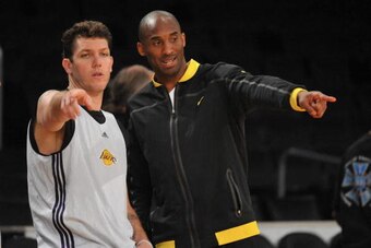LOS ANGELES, CA - JUNE 04: (L - R) Luke Walton #4 and Kobe Bryant #24 of the Los Angeles Lakers participate in practice in preparation for Game Two of the 2010 NBA Finals against the Boston Celtics at Staples Center on June 4, 2010 in Los Angeles, Califor