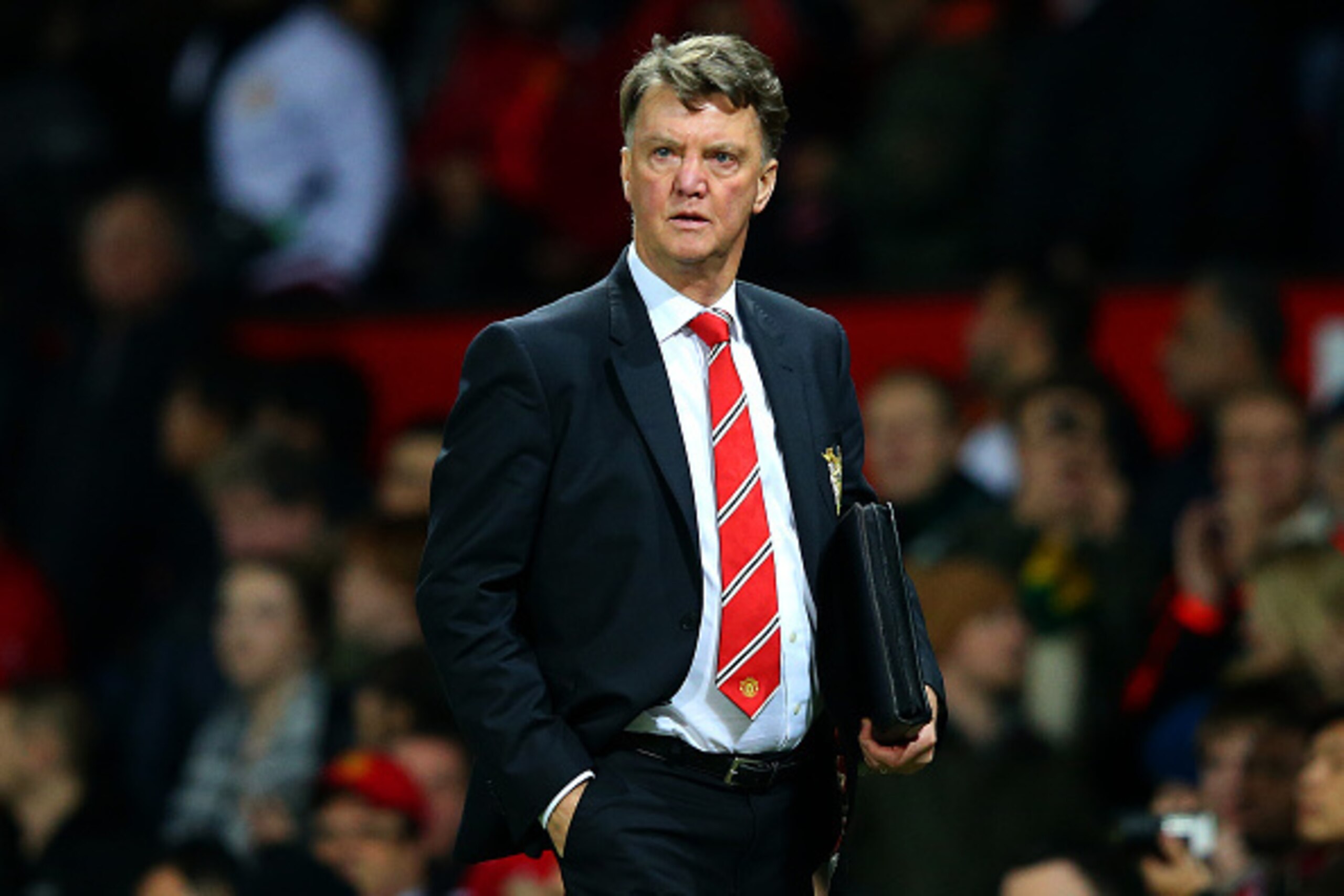 MANCHESTER, ENGLAND - DECEMBER 28:  Louis van Gaal, manager of Manchester United leaves the pitch after the Barclays Premier League match between Manchester United and Chelsea at Old Trafford on December 28, 2015 in Manchester, England.  (Photo by Alex Li