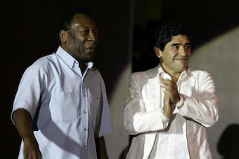 DOHA, QATAR:  Football legends Pele (L) and Maradona attend the inauguration of the ASPIRE Academy of Sports Excellence venue in Doha 17 November 2005.  The academy is the work of French architect Roger Taillibert and funded by the oil and natural gas rev
