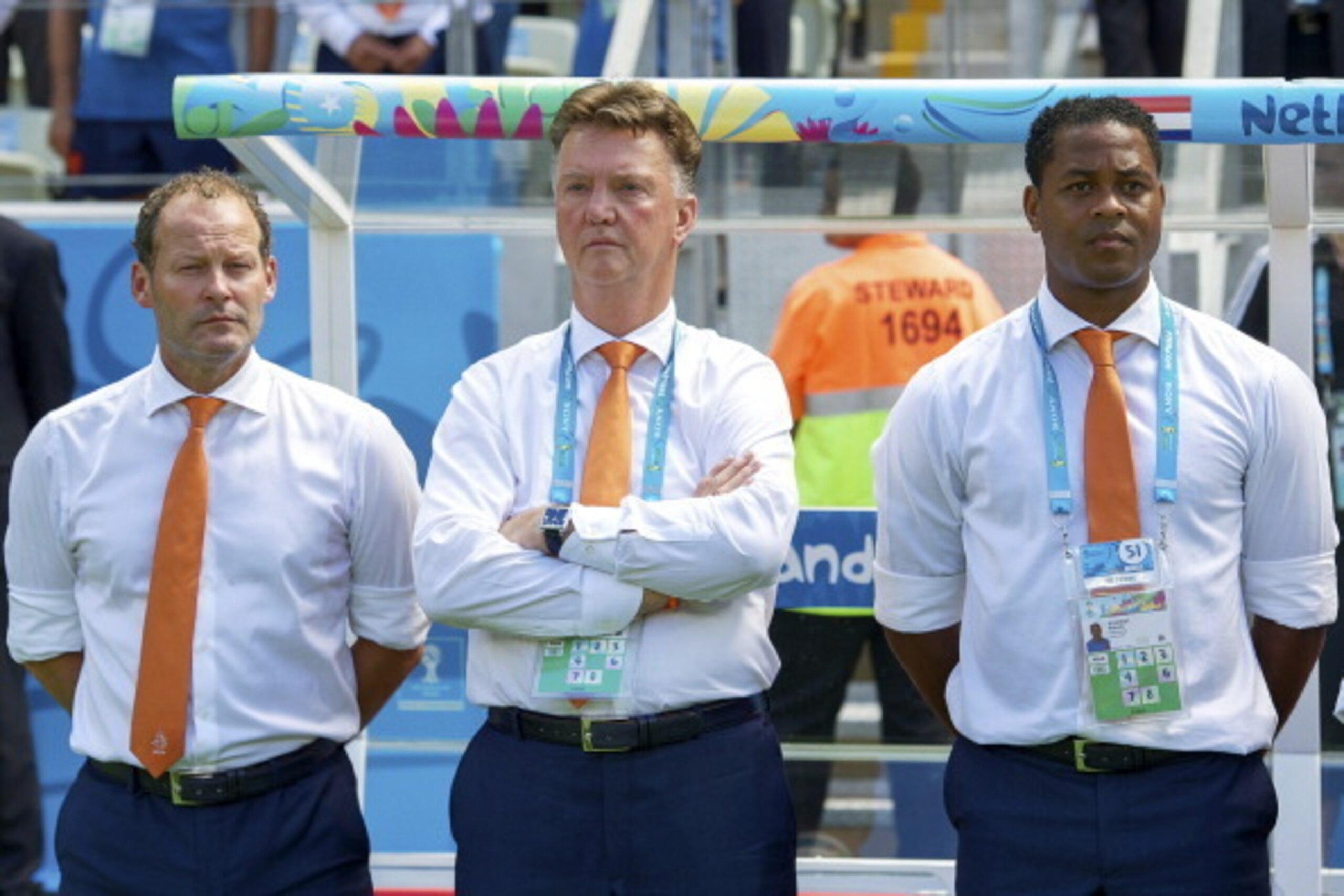 (L-R) assistant trainer Danny Blind of Holland, coach Louis van Gaal of Holland, assistant trainer Patrick Kluivert of Holland during the 1/8 final match between The Netherlands and Mexico on June 29, 2014 at Estadio Castelao in Fortaleza, Brazil.(Photo b