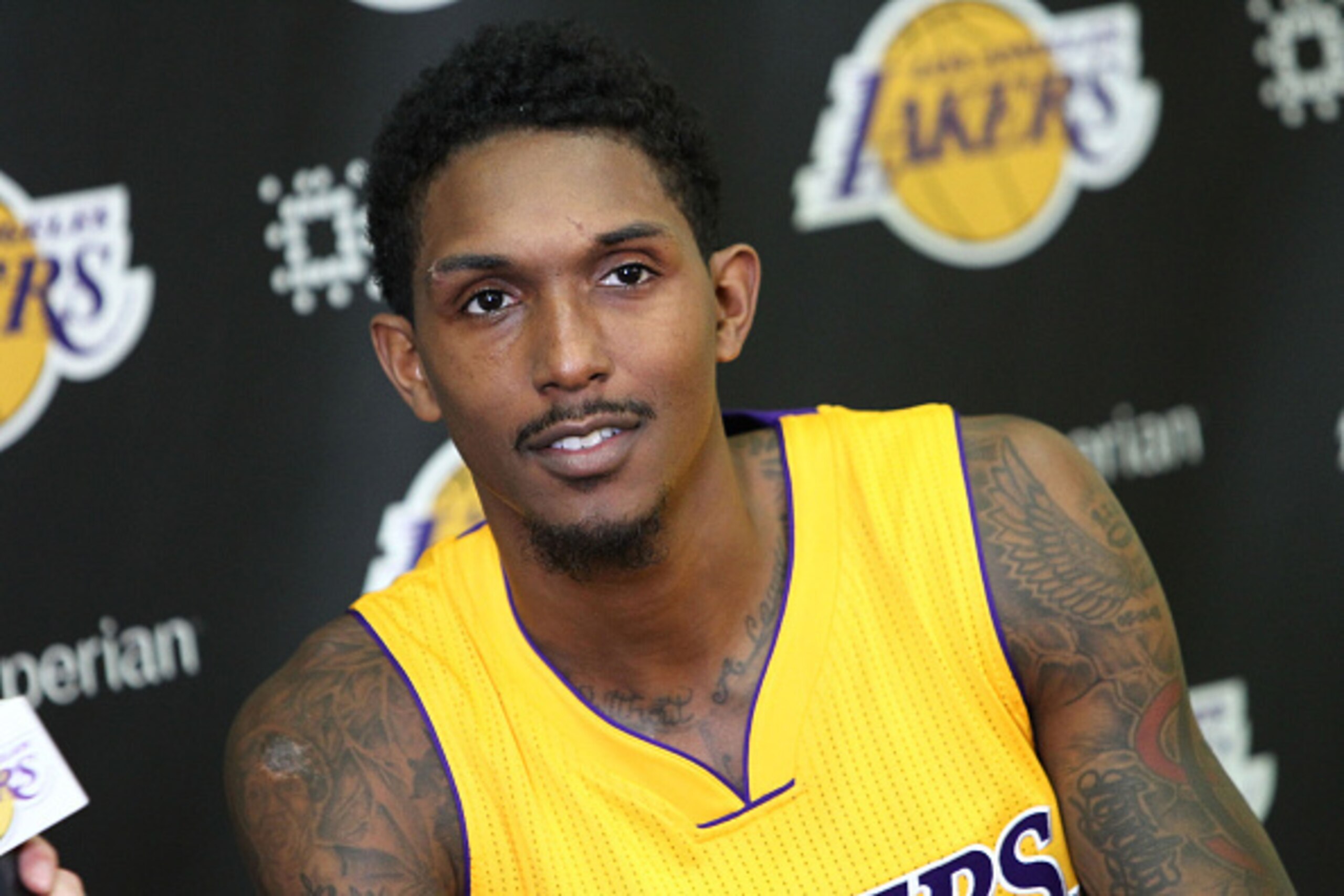 EL SEGUNDO, CA - SEPTEMBER 28:  Lou Williams #23 of the Los Angeles Lakers addresses the media during the Los Angeles Lakers Media Dayat Toyota Sports Center on September 28, 2015 in El Segundo, California.  (Photo by Leon Bennett/Getty Images)