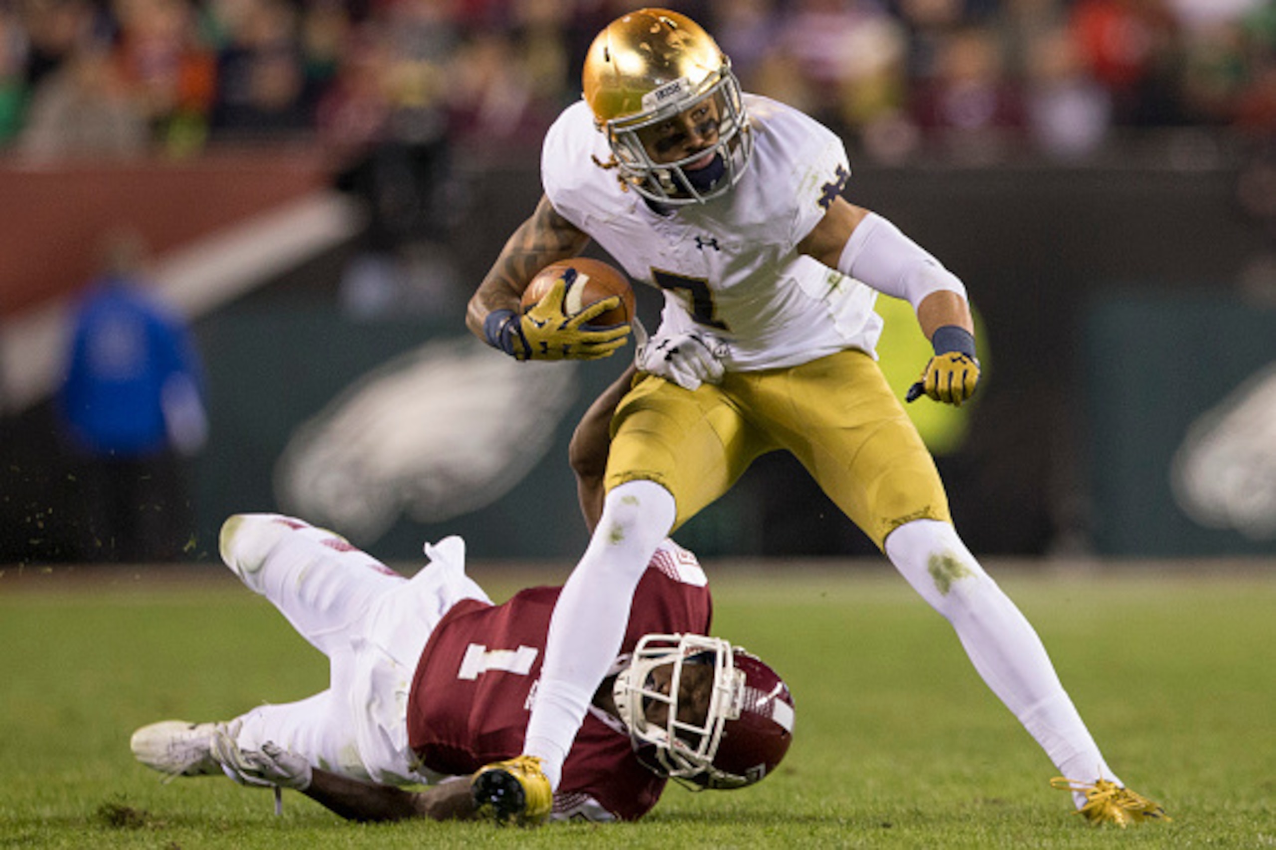 PHILADELPHIA, PA - OCTOBER 31: Will Fuller #7 of the Notre Dame Fighting Irish catches a passes and is tackled by Tavon Young #1 of the Temple Owls in the second quarter on October 31, 2015 at Lincoln Financial Field in Philadelphia, Pennsylvania. (Photo 
